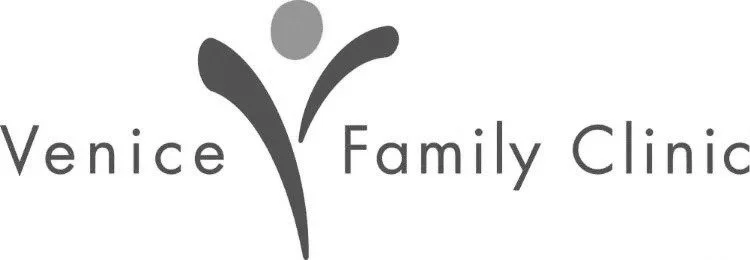 Logo for Venice Family Clinic featuring stylized human figure and text.
