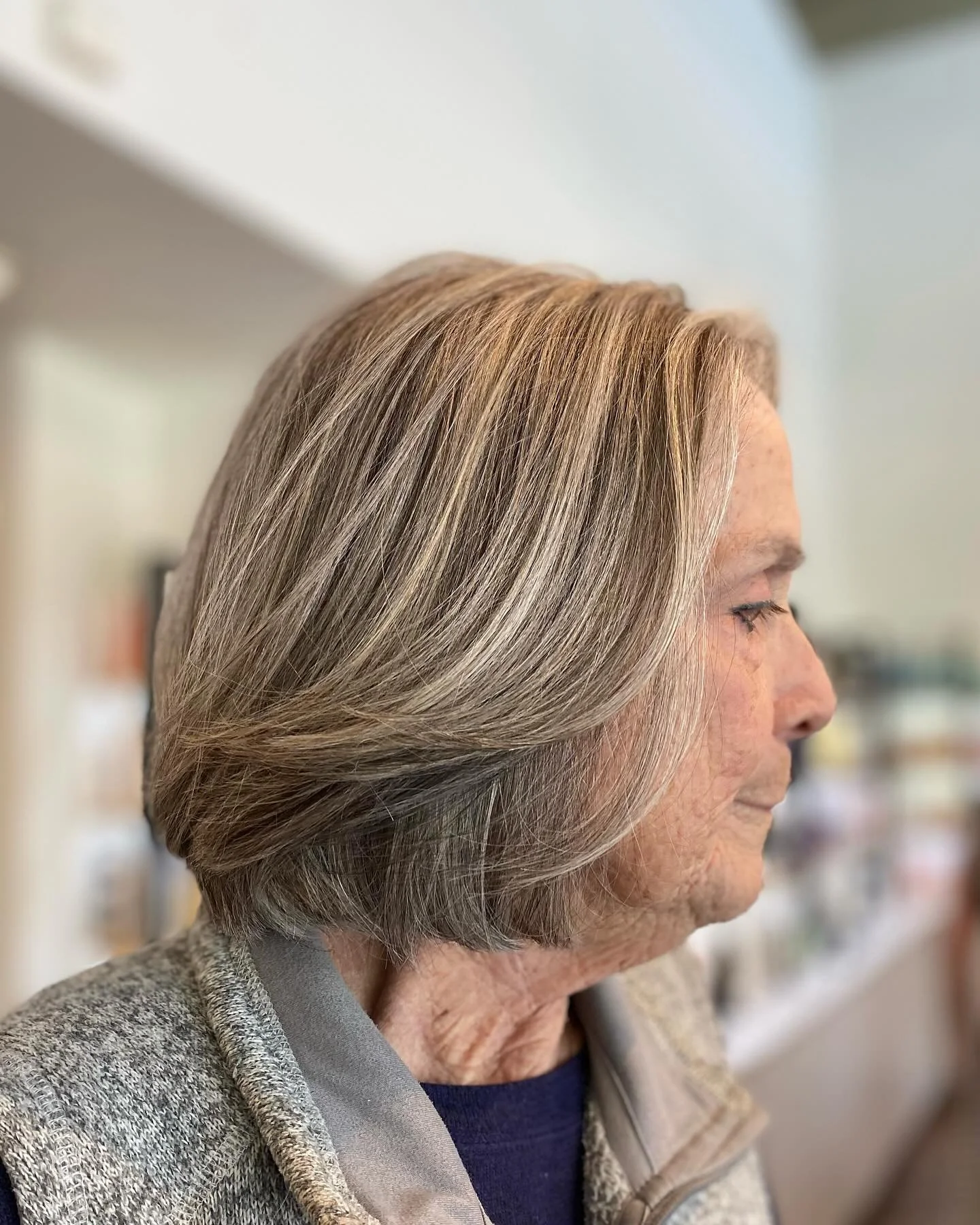 I understood the assignment. When she said she wanted to cover her silver, but still wants it to be silvery. Wow! A gorgeous transformation to wind the clock back a few years! This is how you age positively. Scroll through to see the before. #raleigh