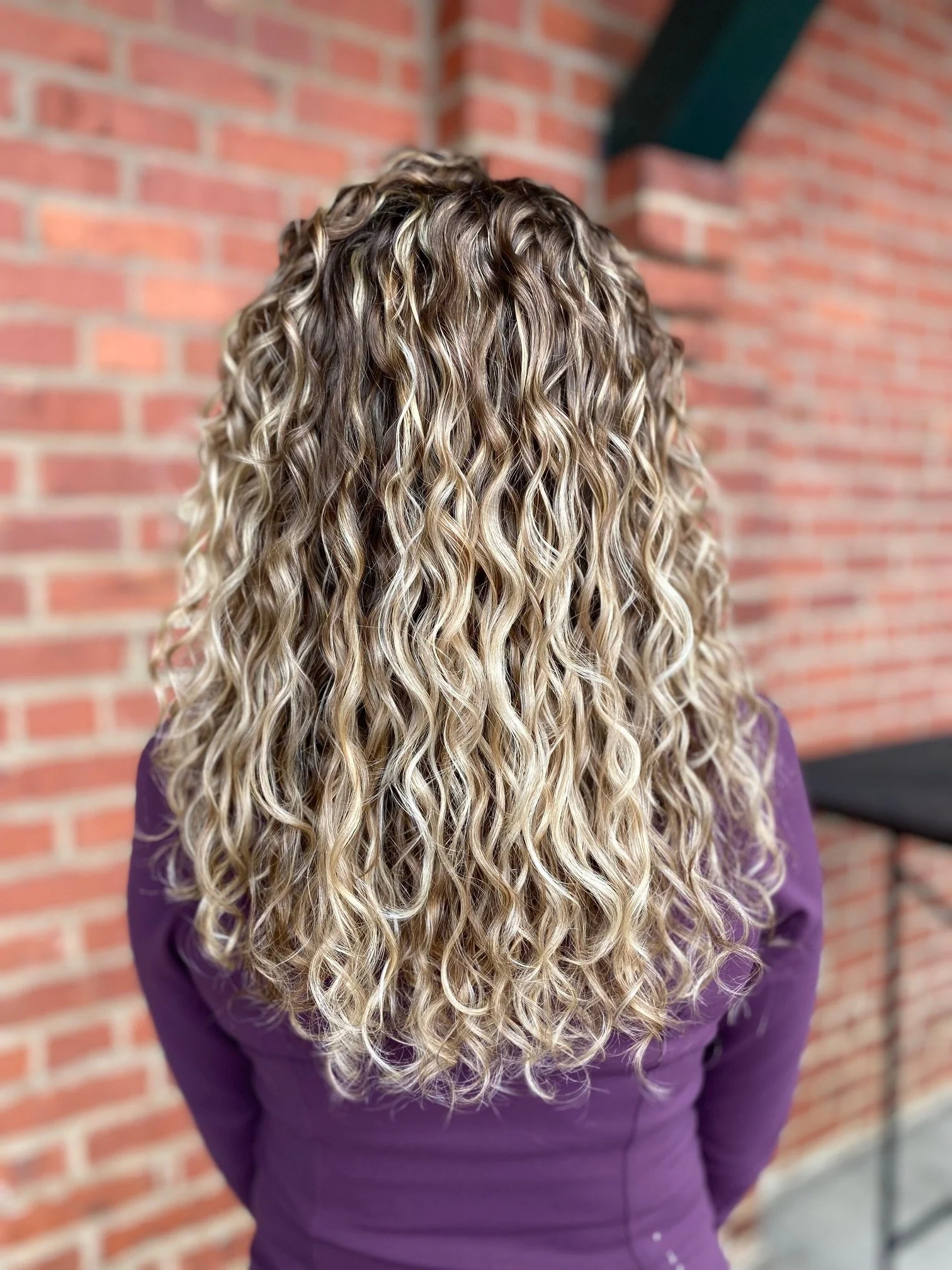 blonde curly hair