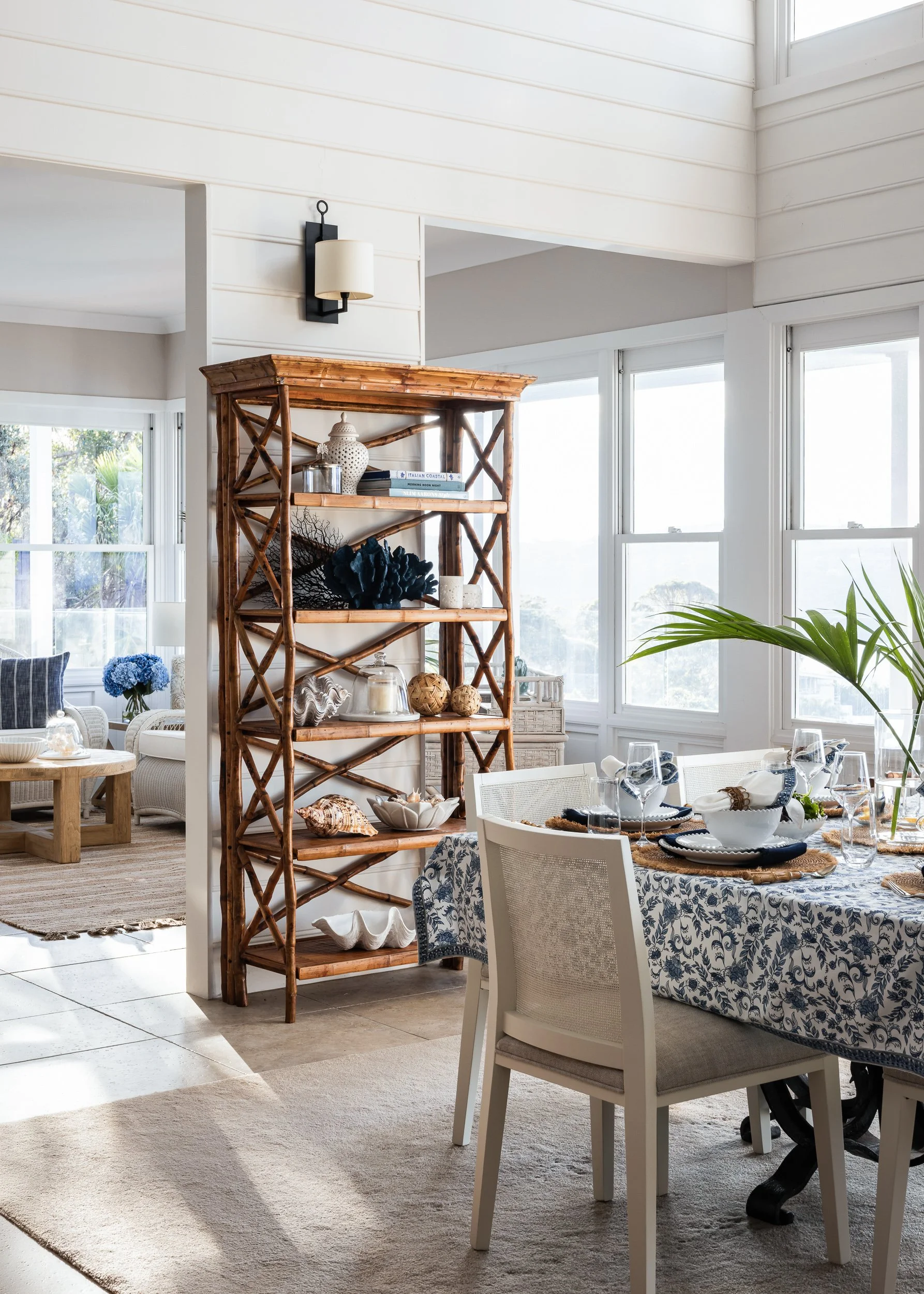 An open-concept living and dining area with modern decor, photographed by interior photographer Diego Pinto in Sydney.