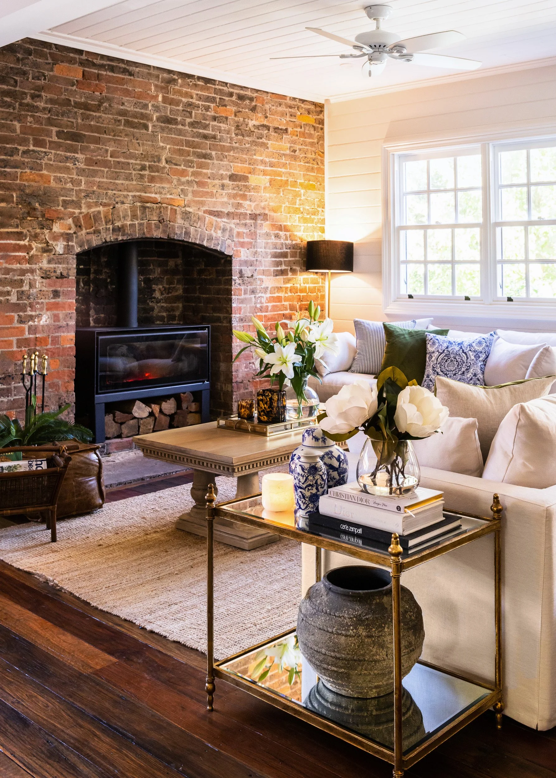 A spacious living room featuring modern furnishings and large windows, captured by Sydney interior photographer Diego Pinto in a timeless editorial style.