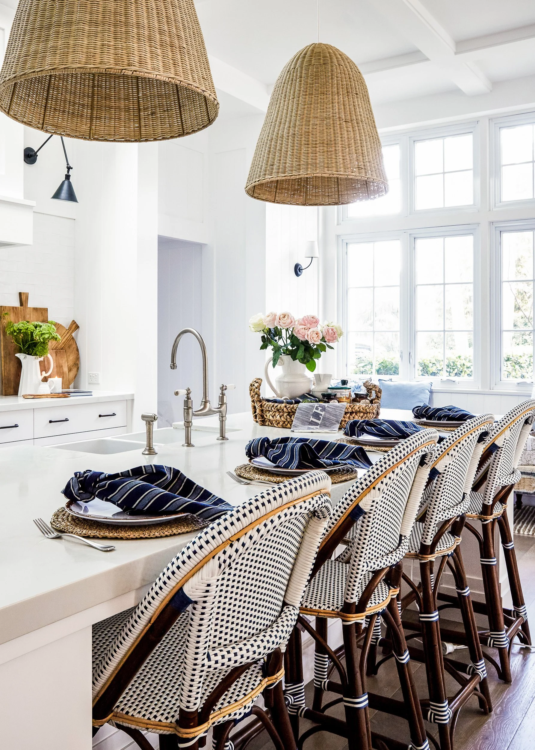 A costal kitchen with clean lines and bar stools, captured by Sydney interior photographer Diego Pinto in his signature editorial style.