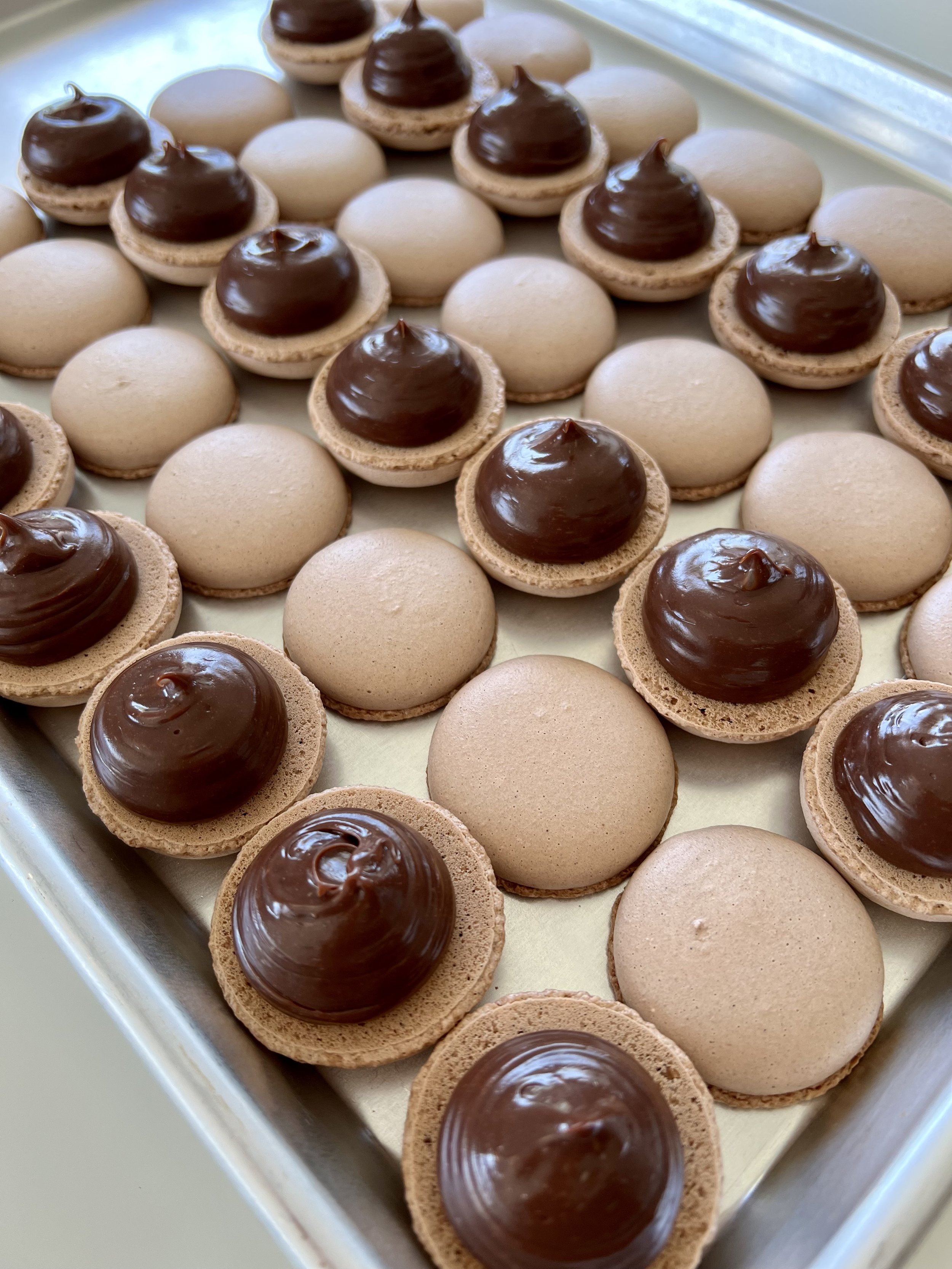 Chocolate macarons filled with chocolate ganache