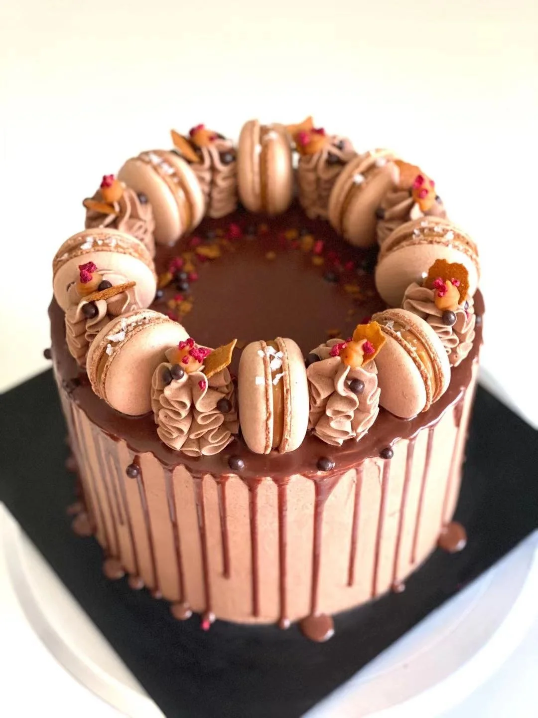 Chocolate sponge, Swiss meringue buttercream, ganache drip and macarons