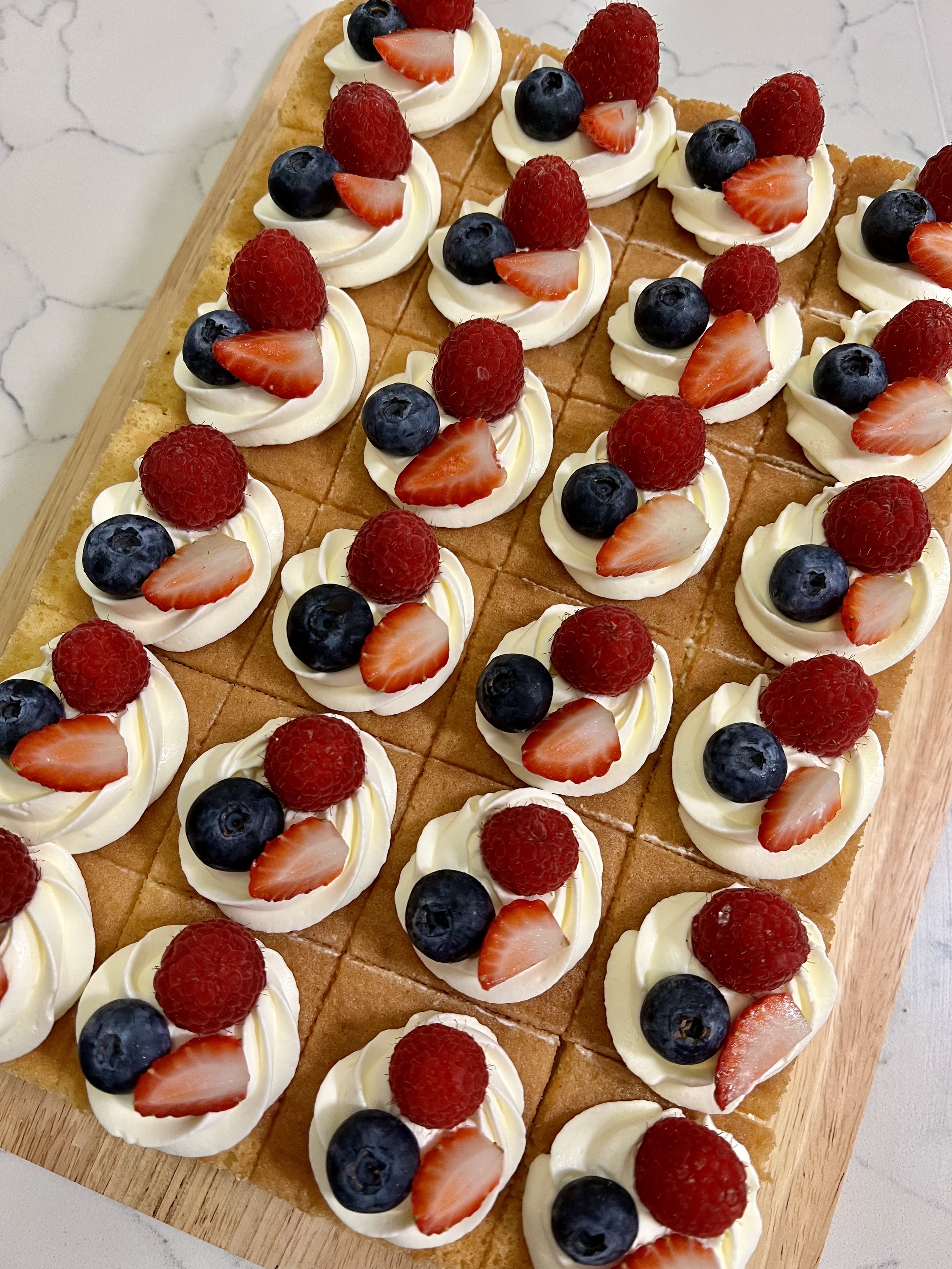 Fresh summer berries, sponge cake, whipped cream