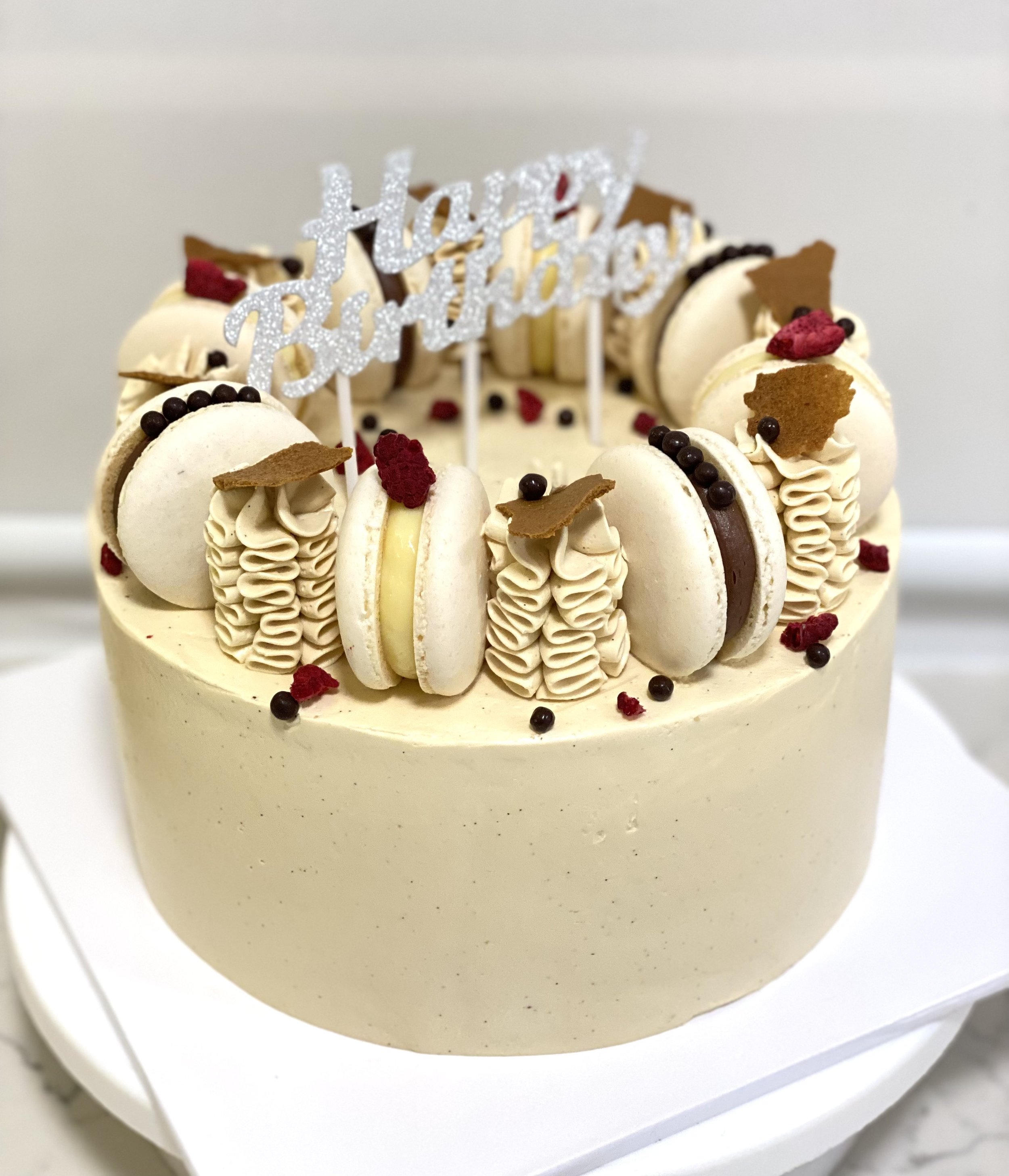 Birthday cake - chocolate sponge, vanilla Swiss meringue buttercream, macarons, chocolate pearls