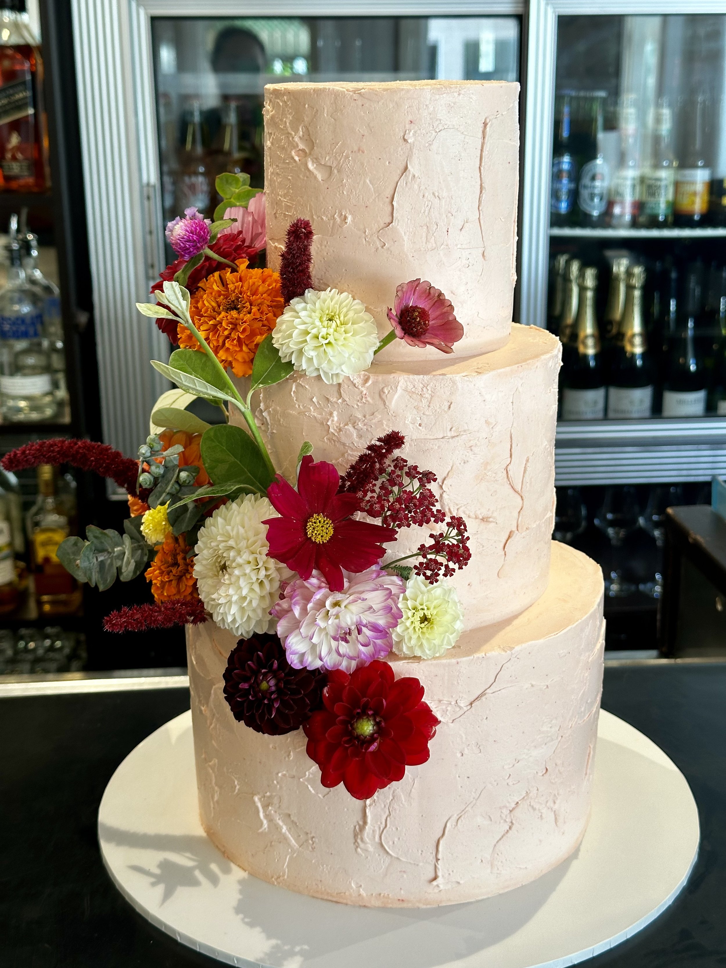 Wedding cake with fresh flowers - vanilla and lemon pound cake, vanilla Swiss meringue buttercream