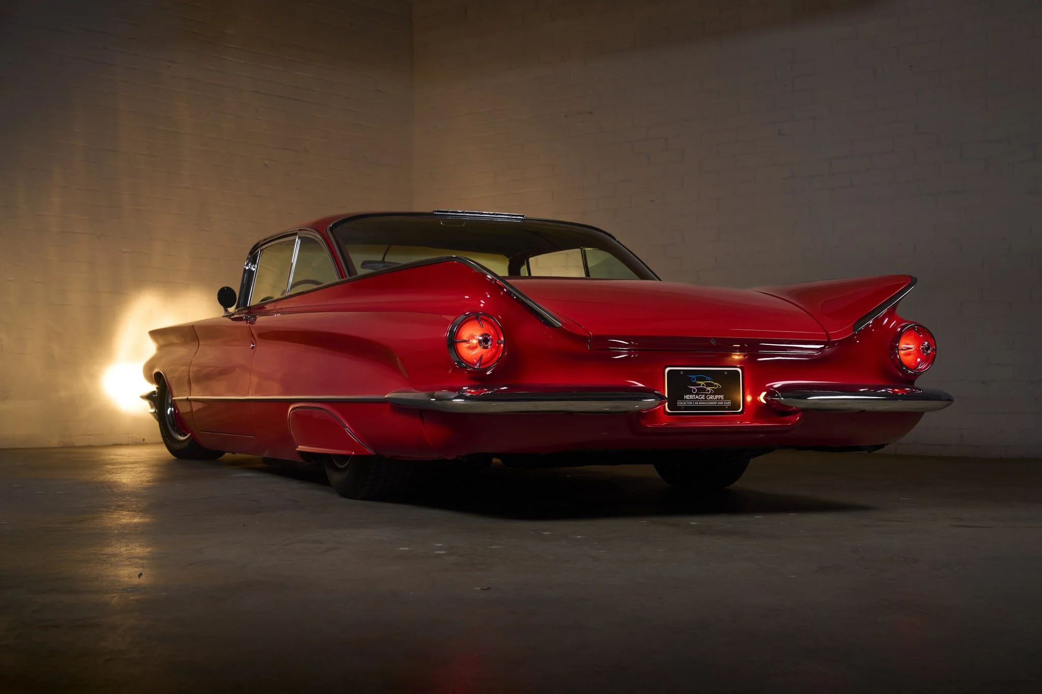 An automotive photograph of a red 1960 Buick LeSabre Custom shot by Fenivision for Heritage Gruppe in Los Angeles, CA. 
