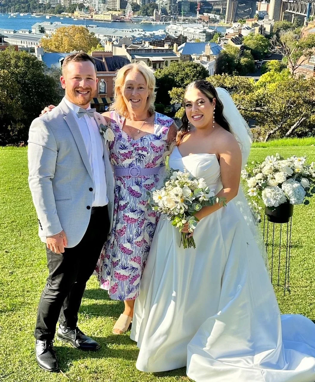 bride & groom with celebrant after wedding ceremony