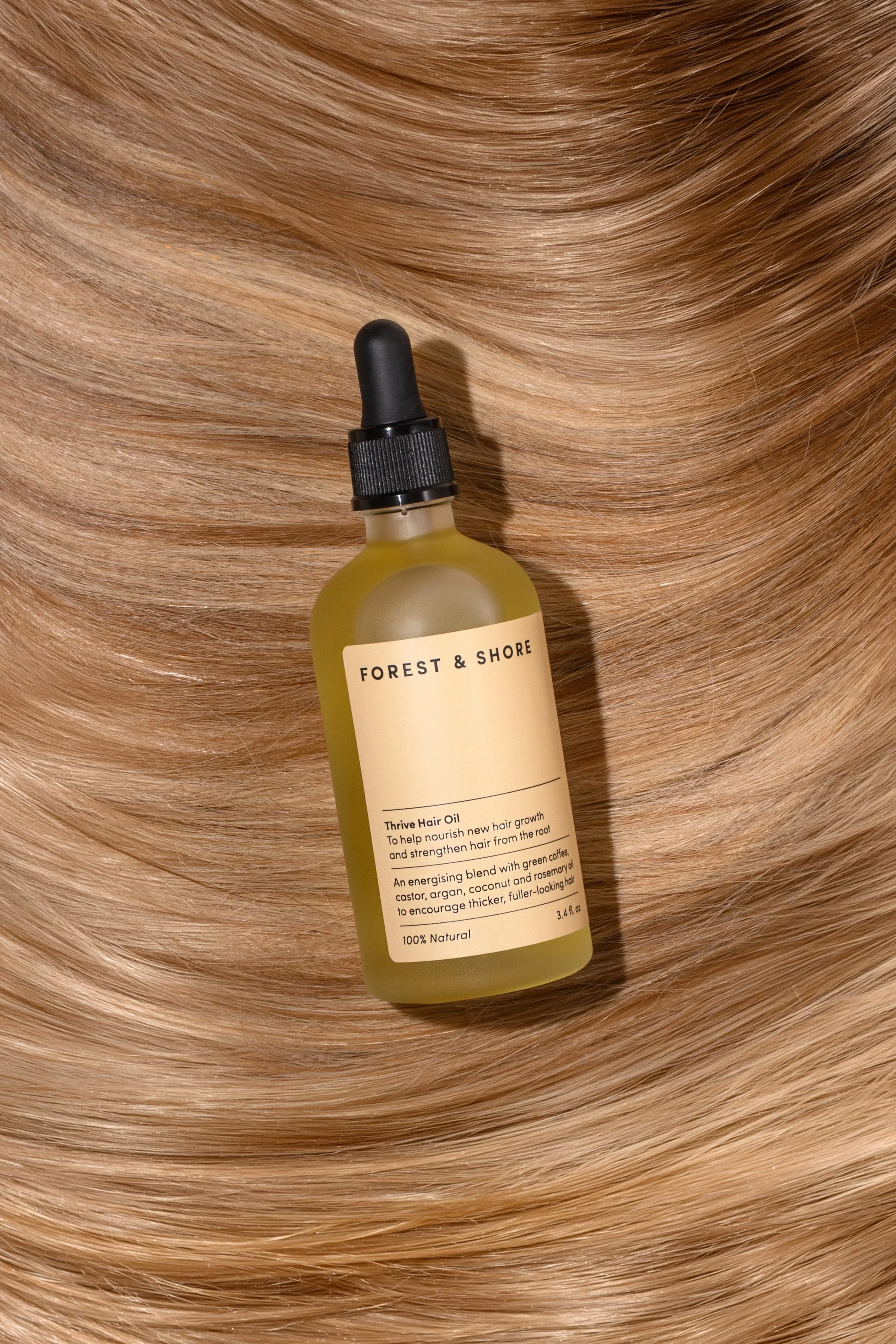 HairSerumOnHairBackdrop.jpg