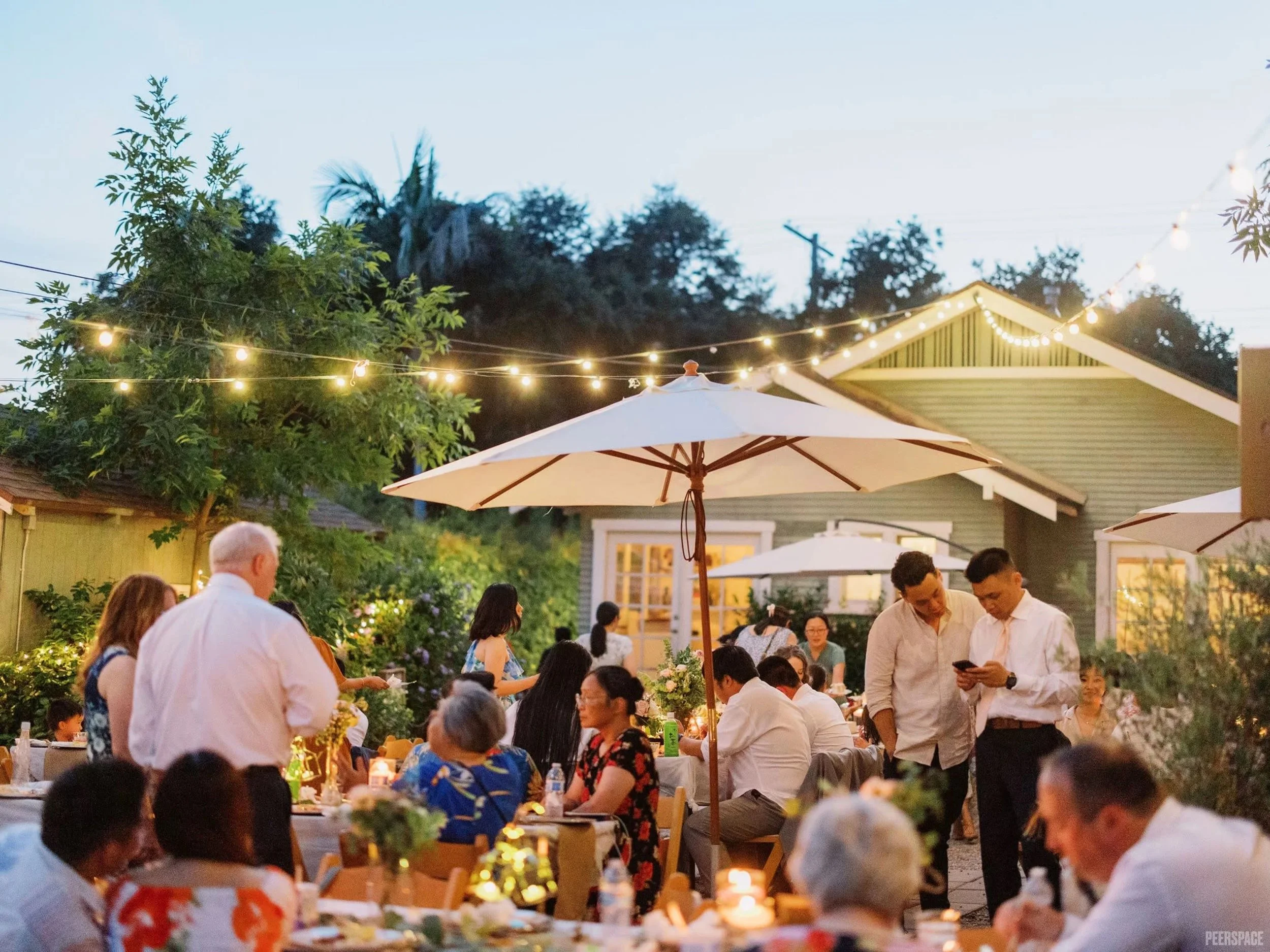 Guests gathered at an outdoor evening event at Provisions Catering venue in Pasadena, California