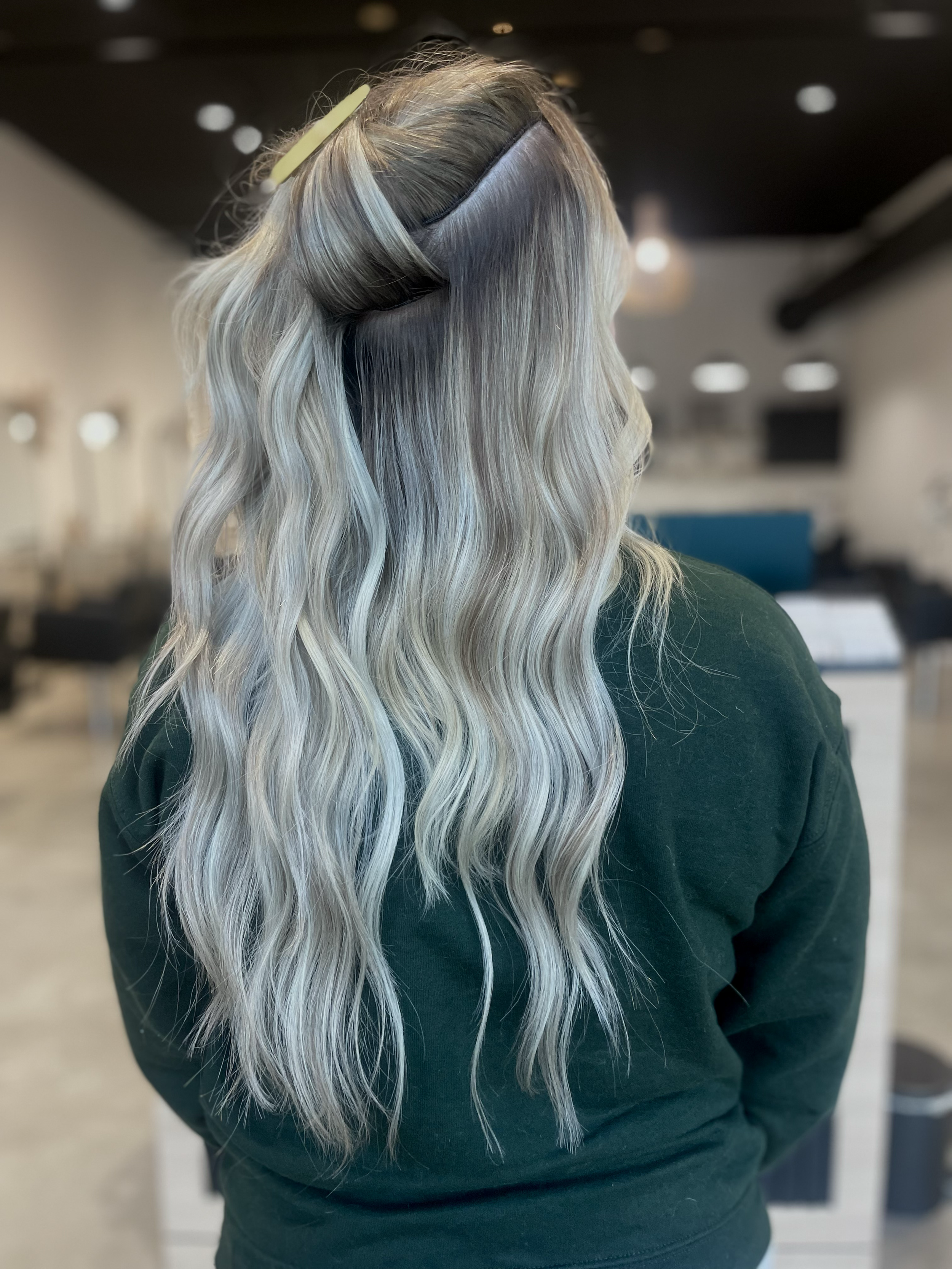 The most comfortable hand-tied extension method, IBE®, installed by a certified artist at The Industry CR.