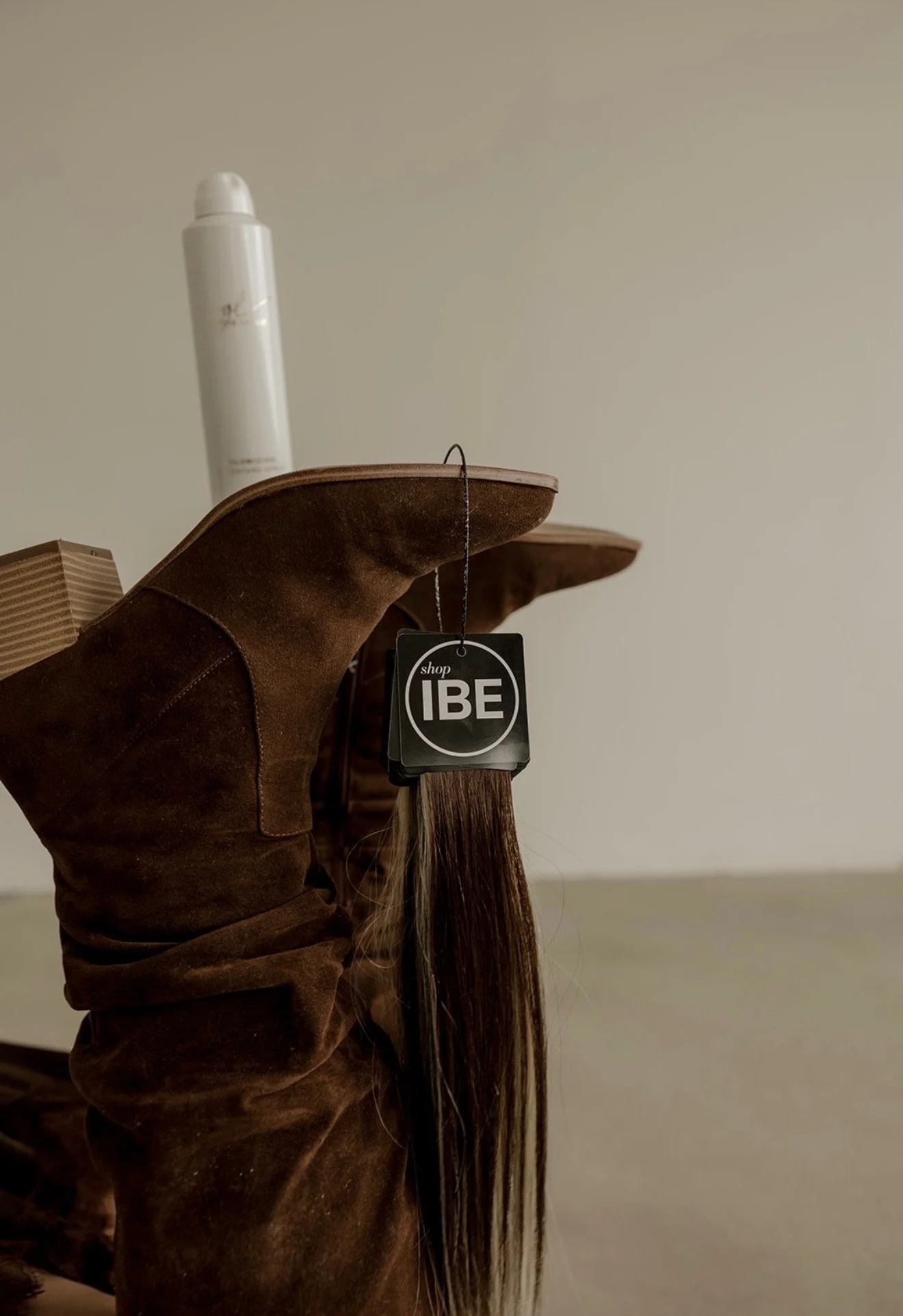 Aesthetic and intentional salon interior at The Industry, featuring a clean, modern design for a premium client experience in Iowa.