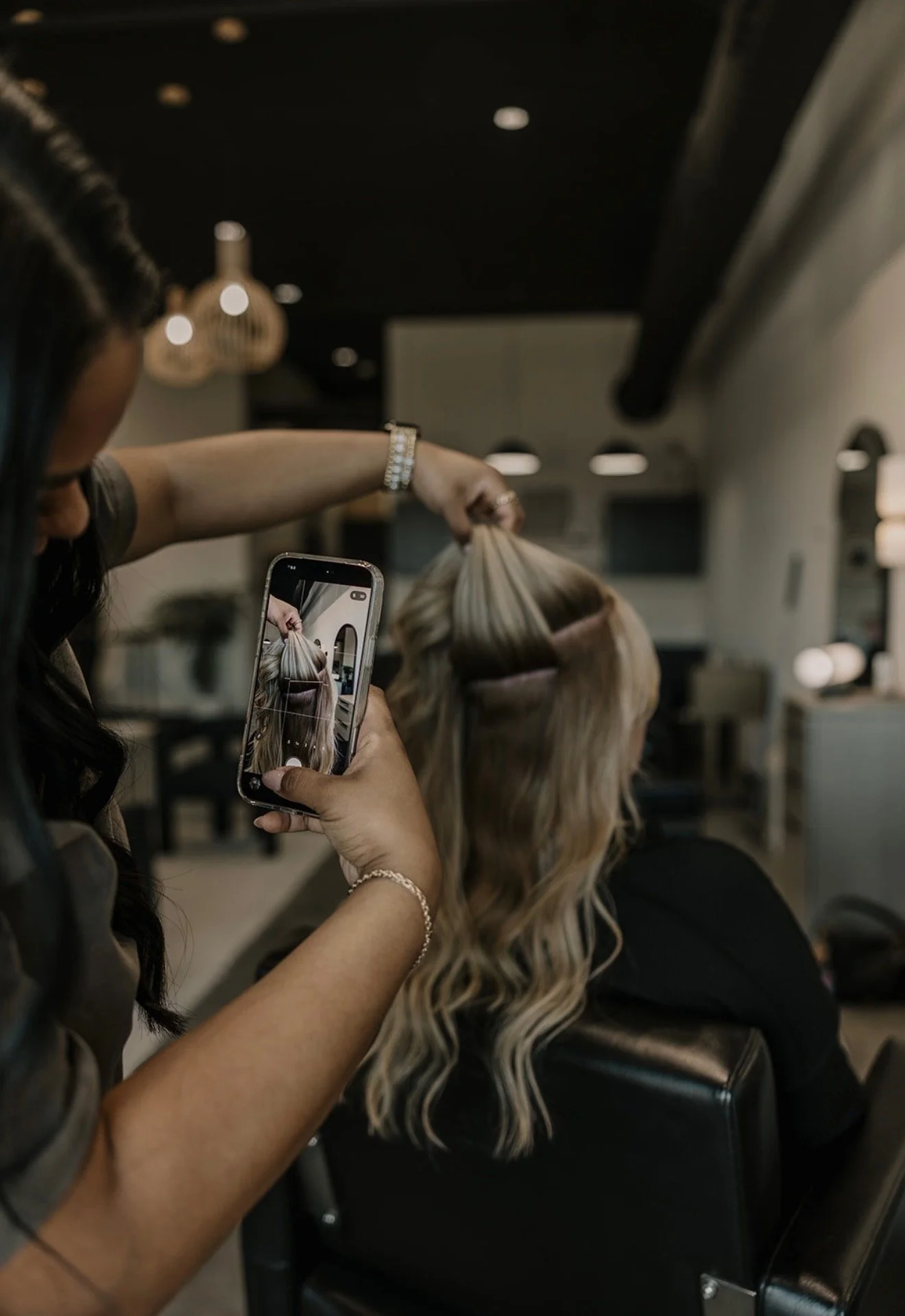 A seamless lived-in blonde hair color with soft dimension and a natural blend created by a specialist at The Industry CR.