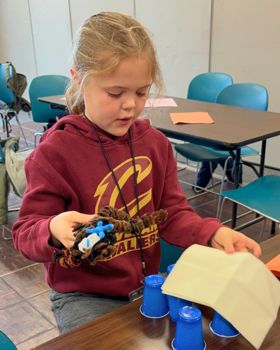 girl builds stadium .png