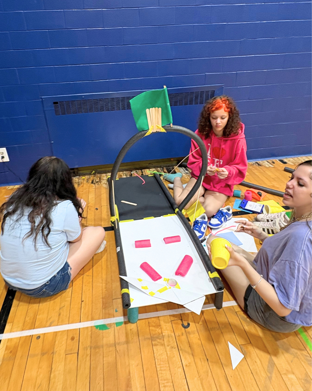 Teen girls build Mini Golf Course.png