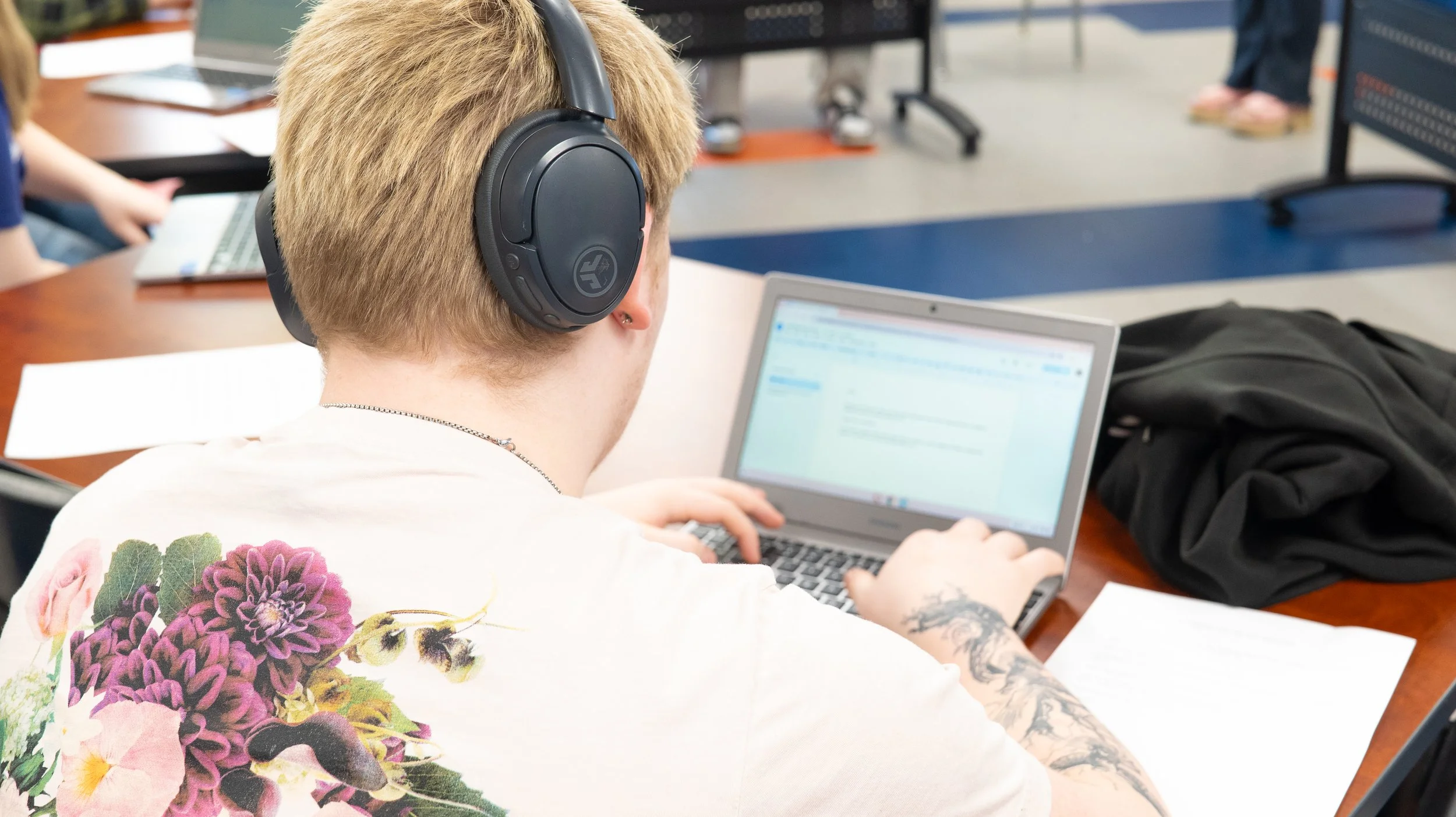 high school boy on computer - image over teen's shoulder