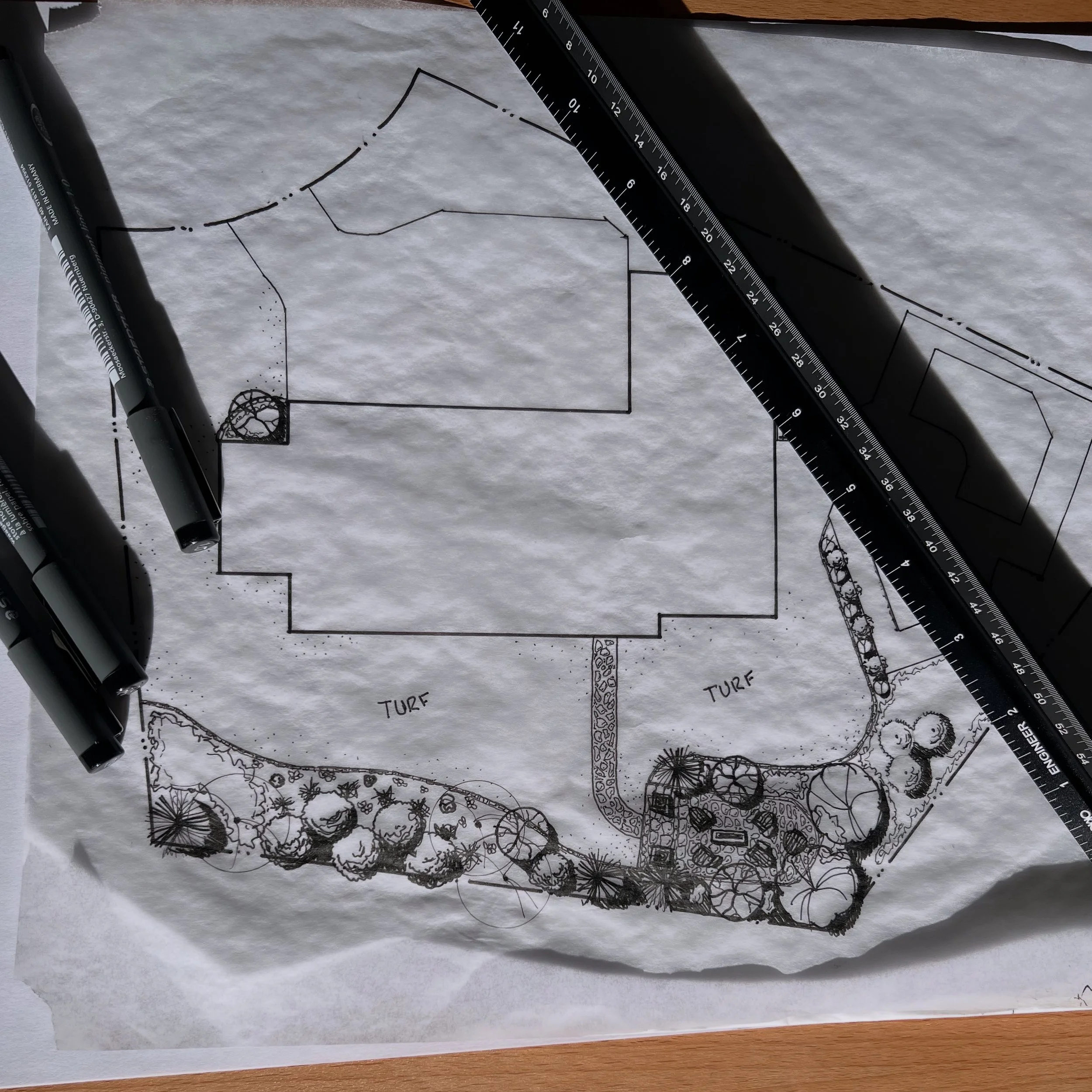 A schematic overview of the redesigned landscape, showing how turf, drainage, planting, and the event space interlock into a cohesive modern composition.