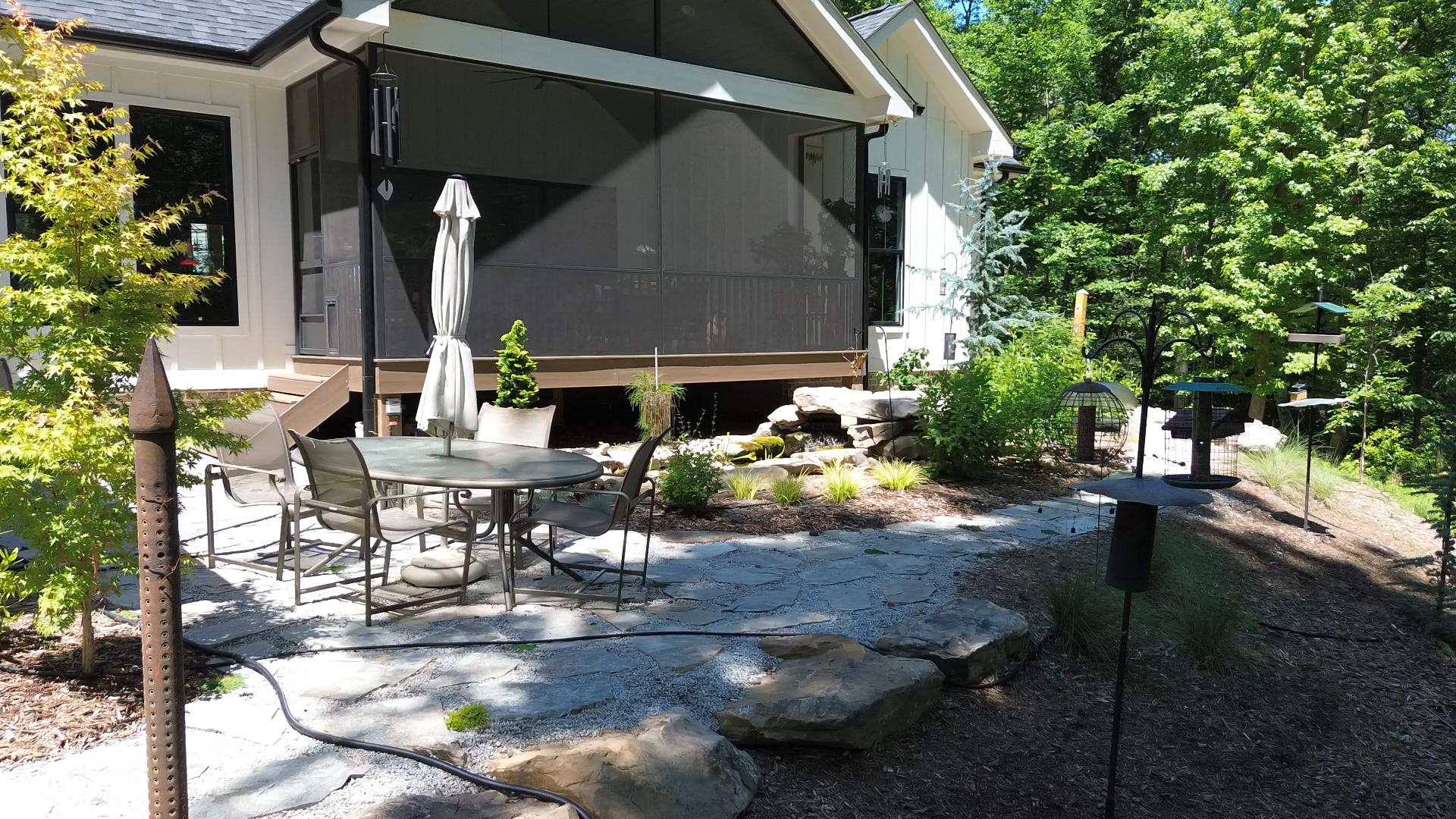 Thoughtfully integrated into the surrounding terrain, the terrace creates a comfortable outdoor destination while maintaining a strong connection to the character of the site.