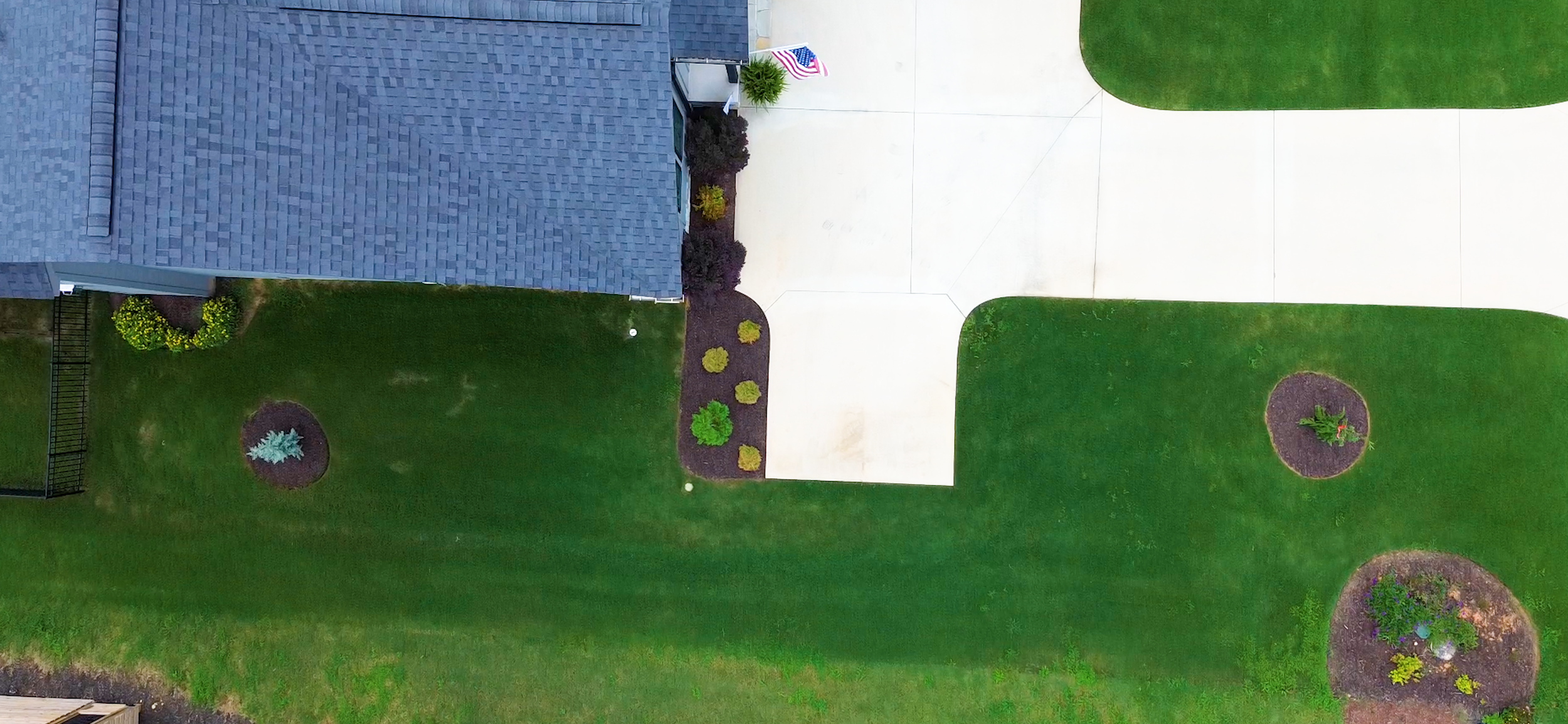 From this angle, the clean geometry of the planting beds is unmistakable, demonstrating how faithfully the design was brought to life.