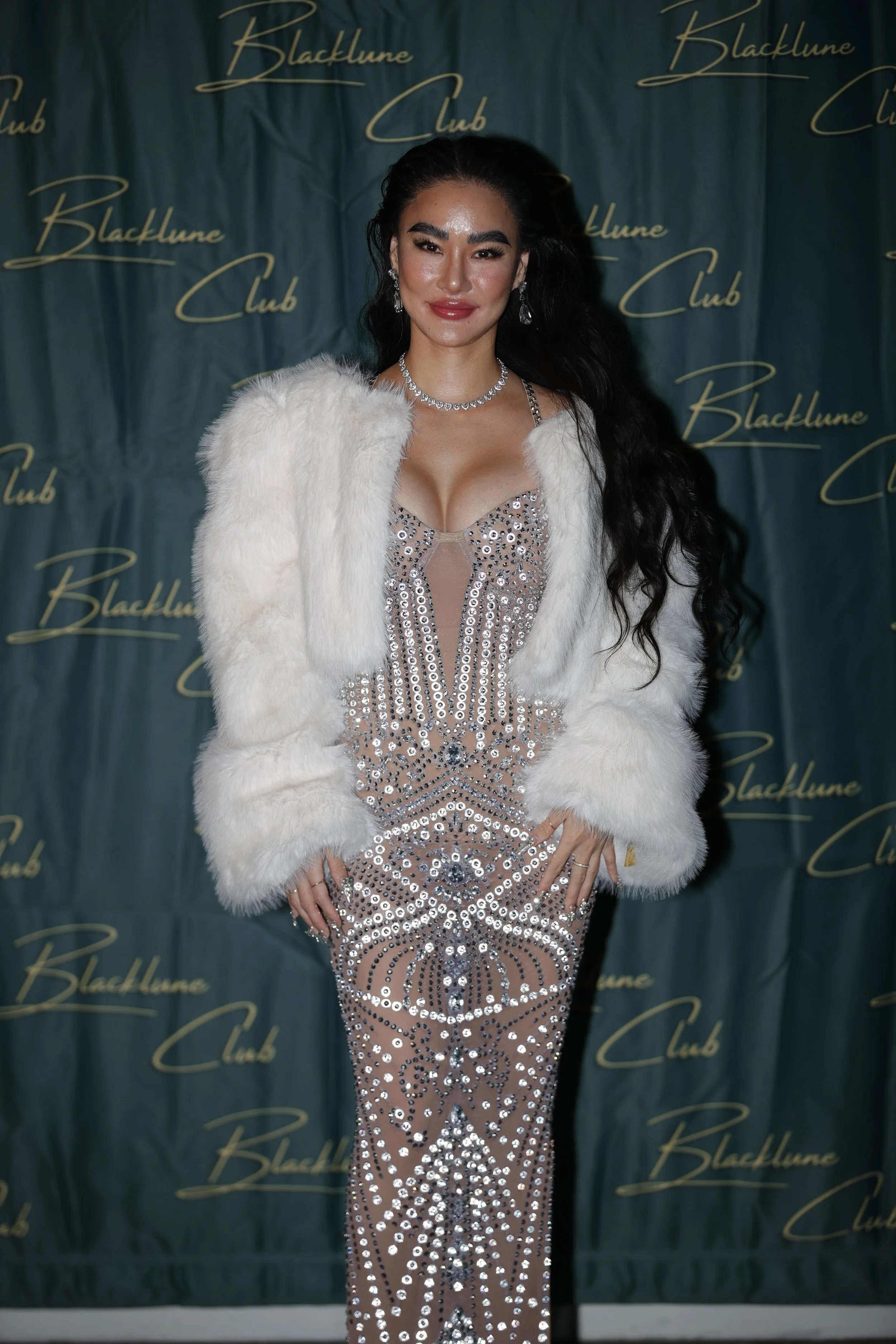 08-crystal-gown-step-repeat.jpg