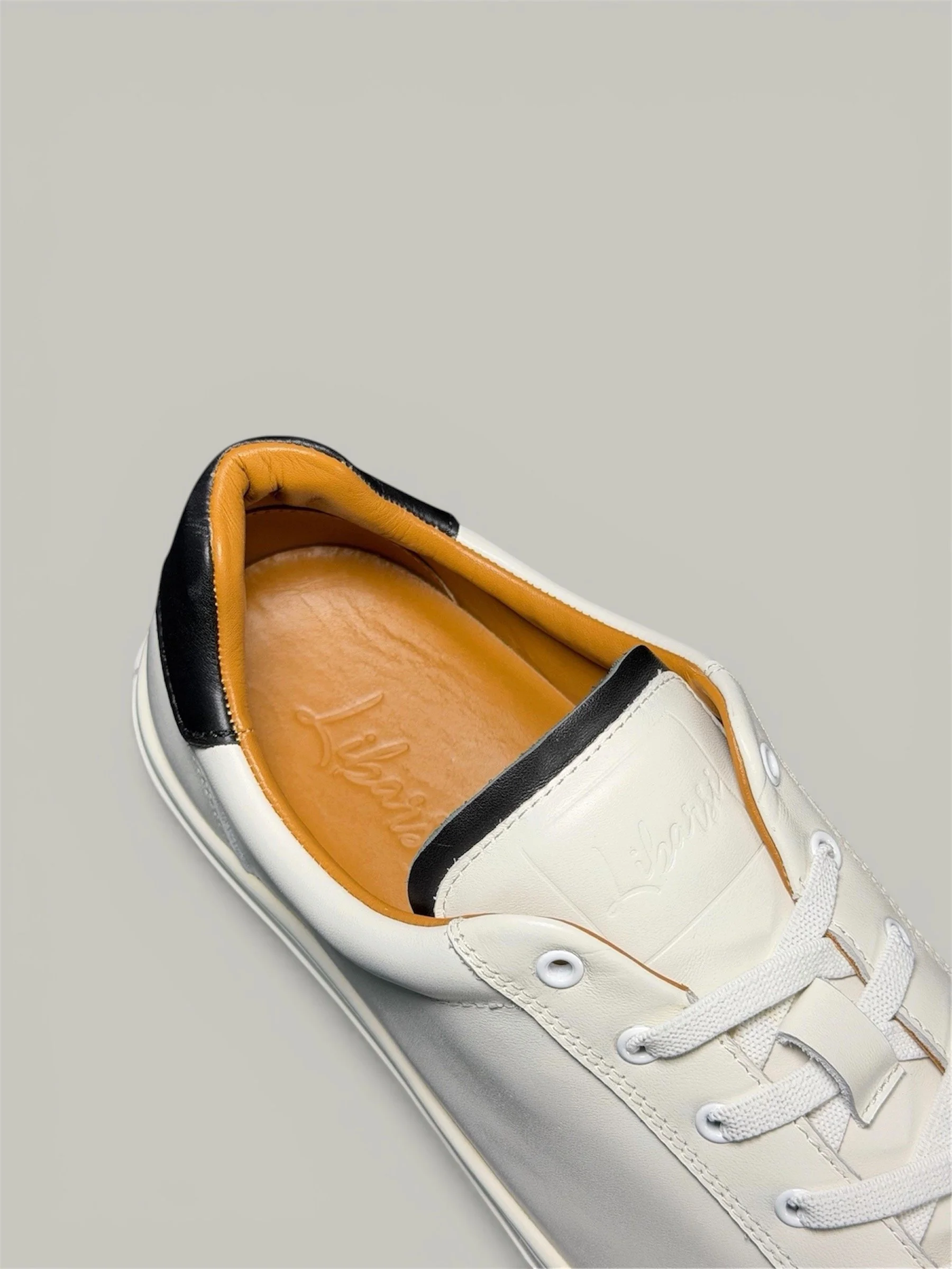 white insole gray background.jpeg