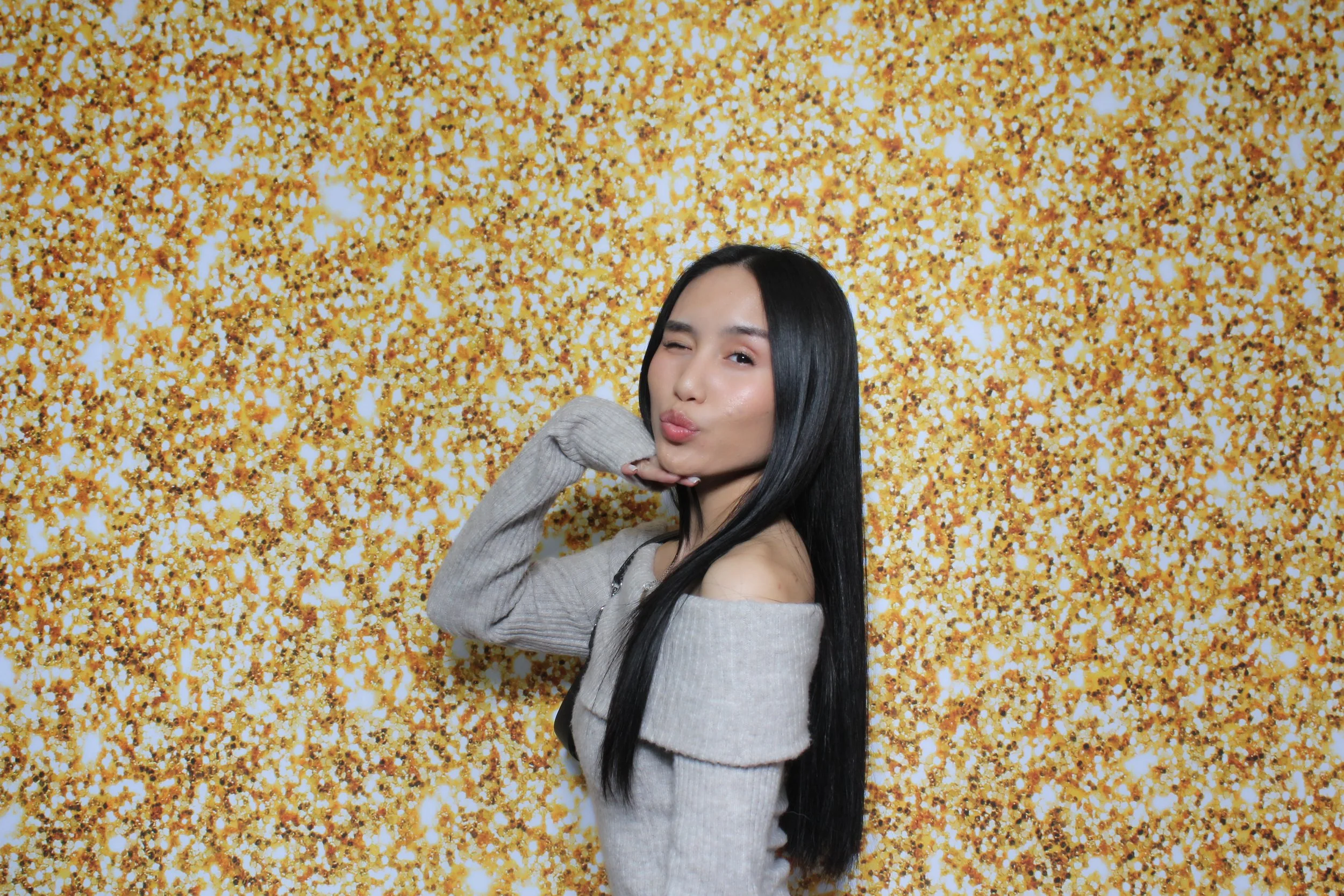 Photo Booth Picture with Gold Backdrop
