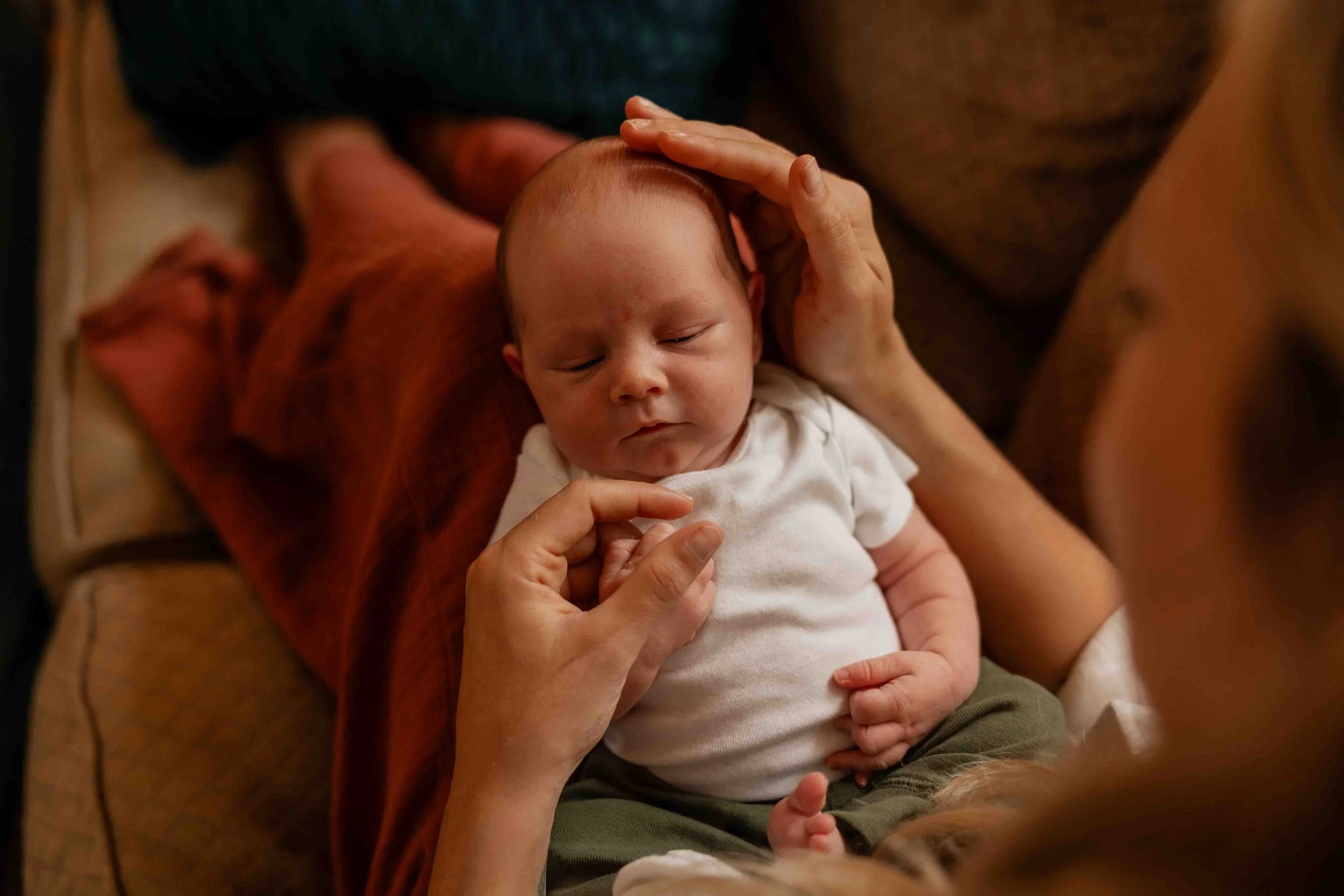 Mother holding newborn baby in Bellingham