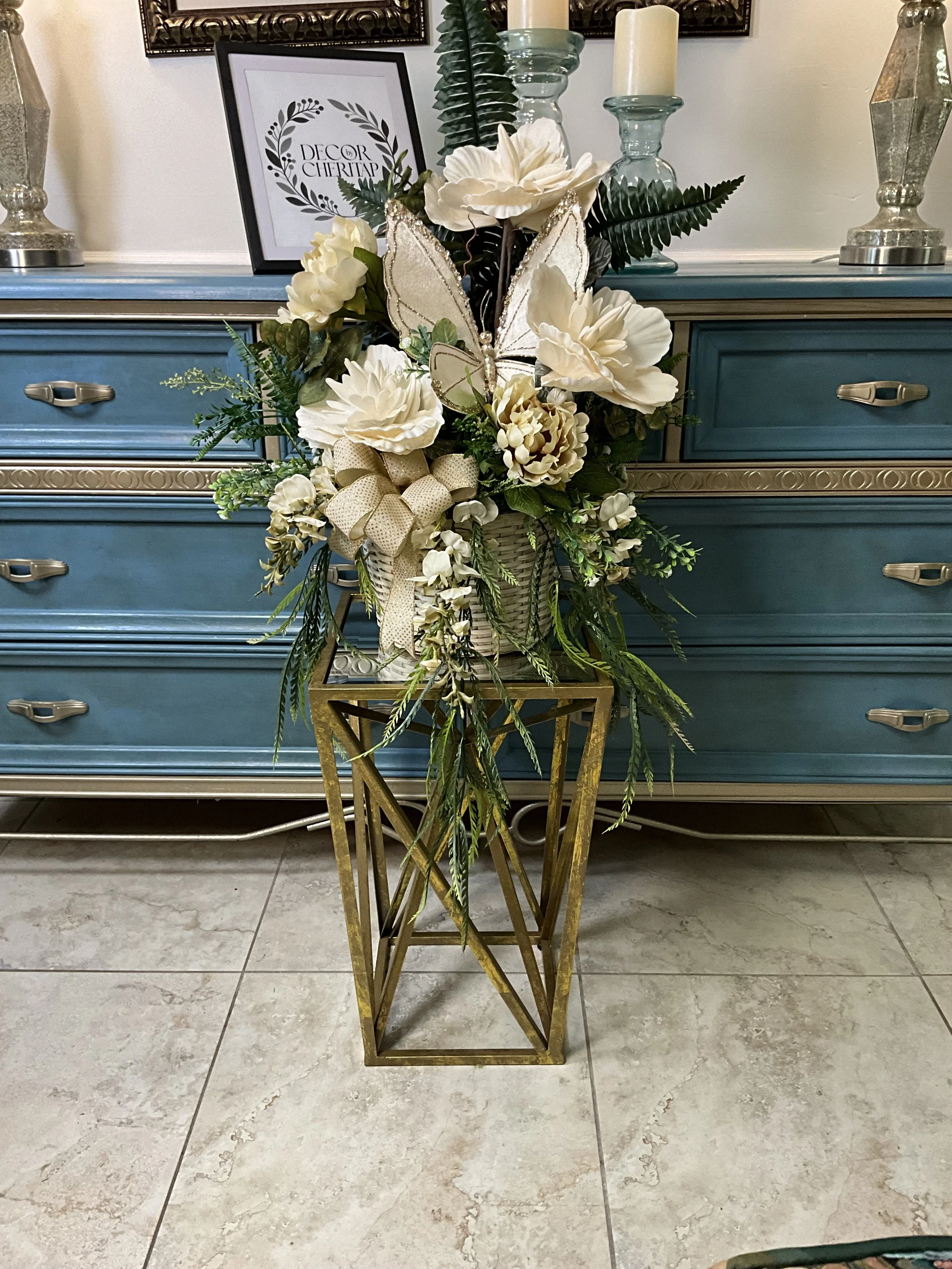 Cream and gold butterfly floral arrangement