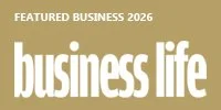 Cover page of a magazine titled 'Business Life 2026' with a beige background.
