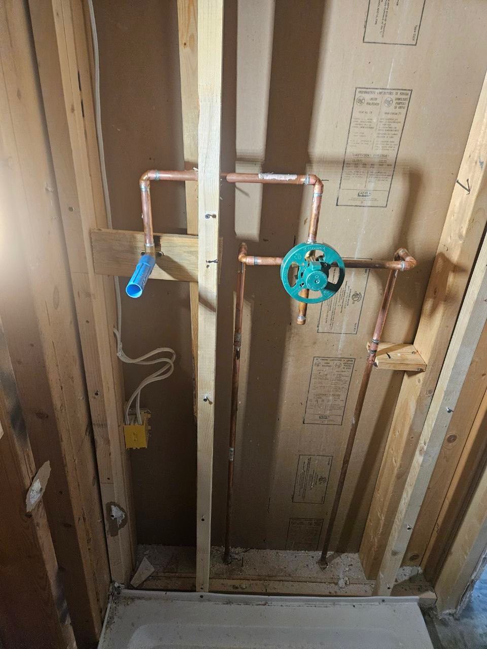 New shower plumbing rough-in installed