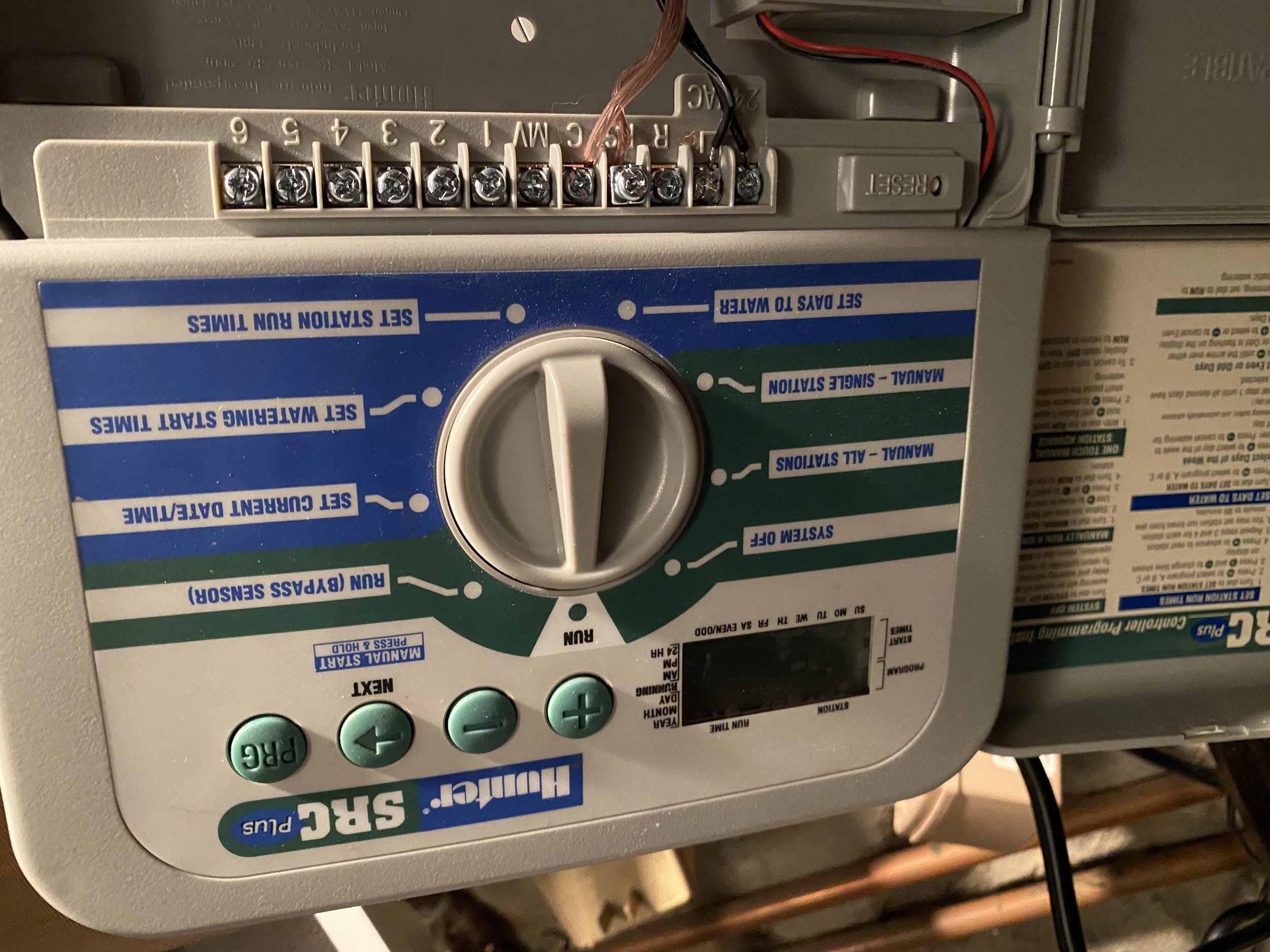 removing the old Irrigation unit and installing a new smart controller