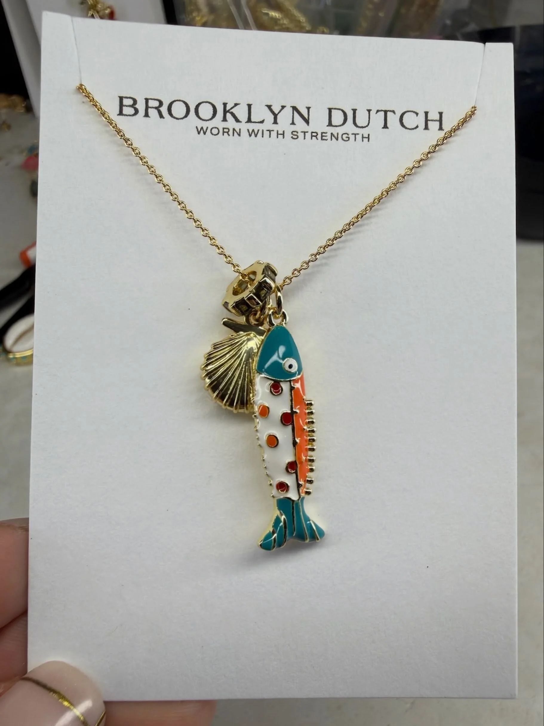 Tiny treasures, all in one necklace.

The kind of piece that makes every outfit feel a little more like summer 🐚