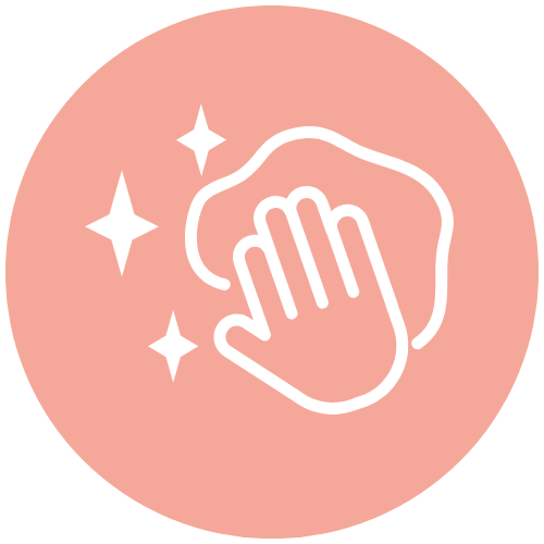 Icon of a hand wiping a surface with sparkles, symbolizing cleaning or disinfecting.