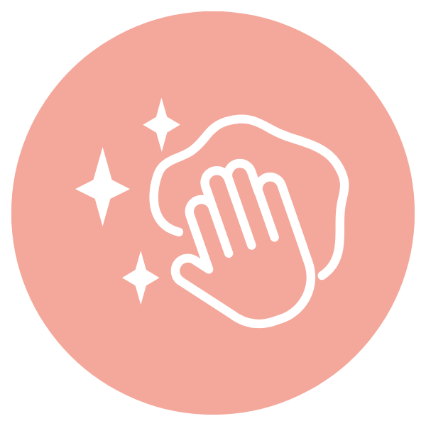 Icon of a hand wiping a surface with sparkles indicating cleaning or disinfection.