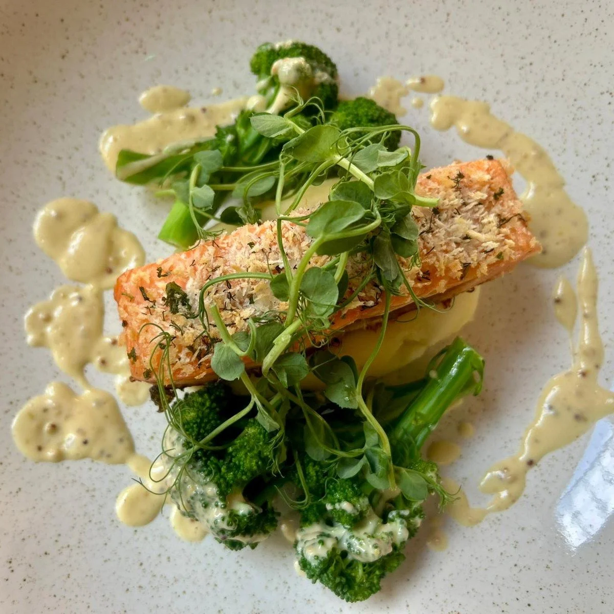 Catch of the Day! 🐟 

Today we&rsquo;re serving a mouth-watering herb-crusted salmon fillet topped with a rich wholegrain mustard &amp; cream sauce, served over silky mashed potatoes. 

Pure comfort. Pure flavour.

Reserve your table online or call 