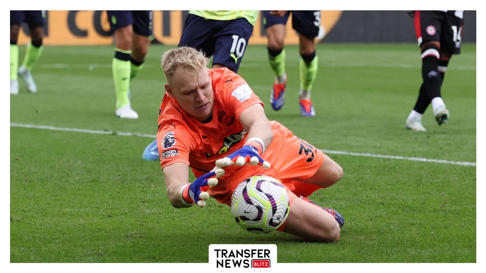 Aaron Ramsdale saves low.