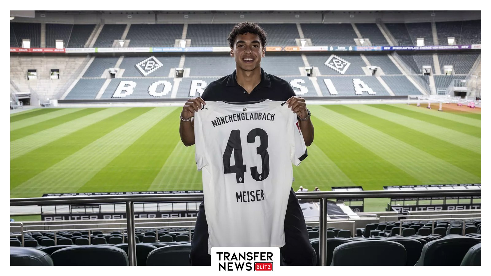 Tyler Meiser poses with a Borussia Monchengladbach shirt.