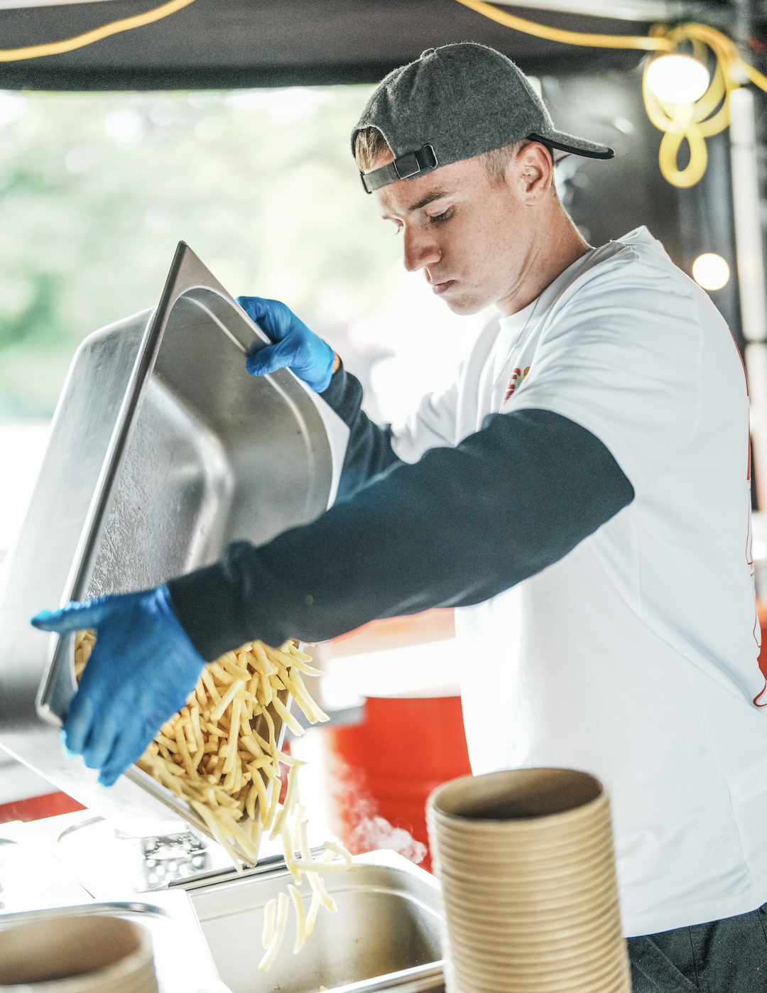 Crooked Kitchens staff serving delicious fries