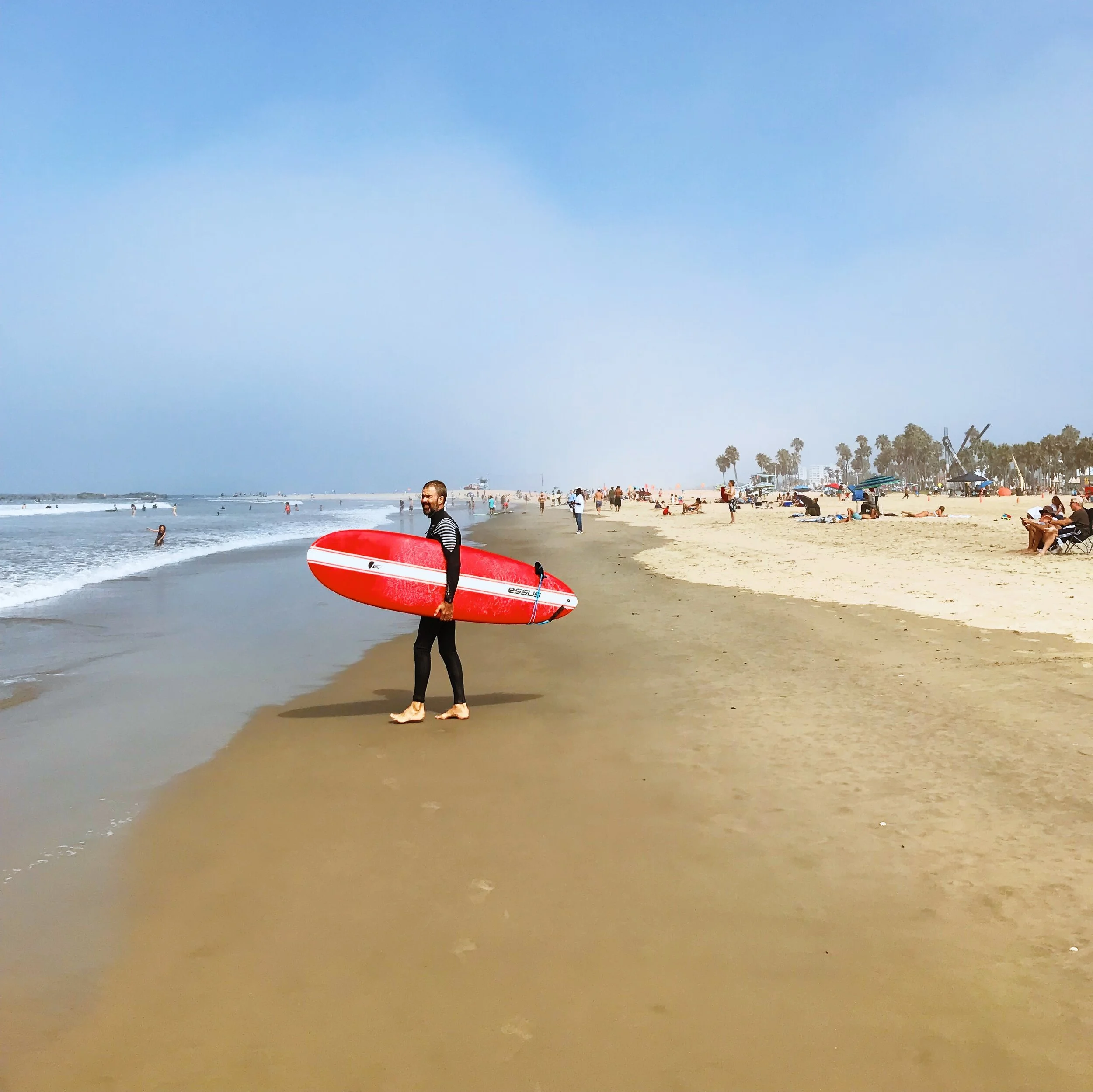 Surfer on beach in Los Angeles
