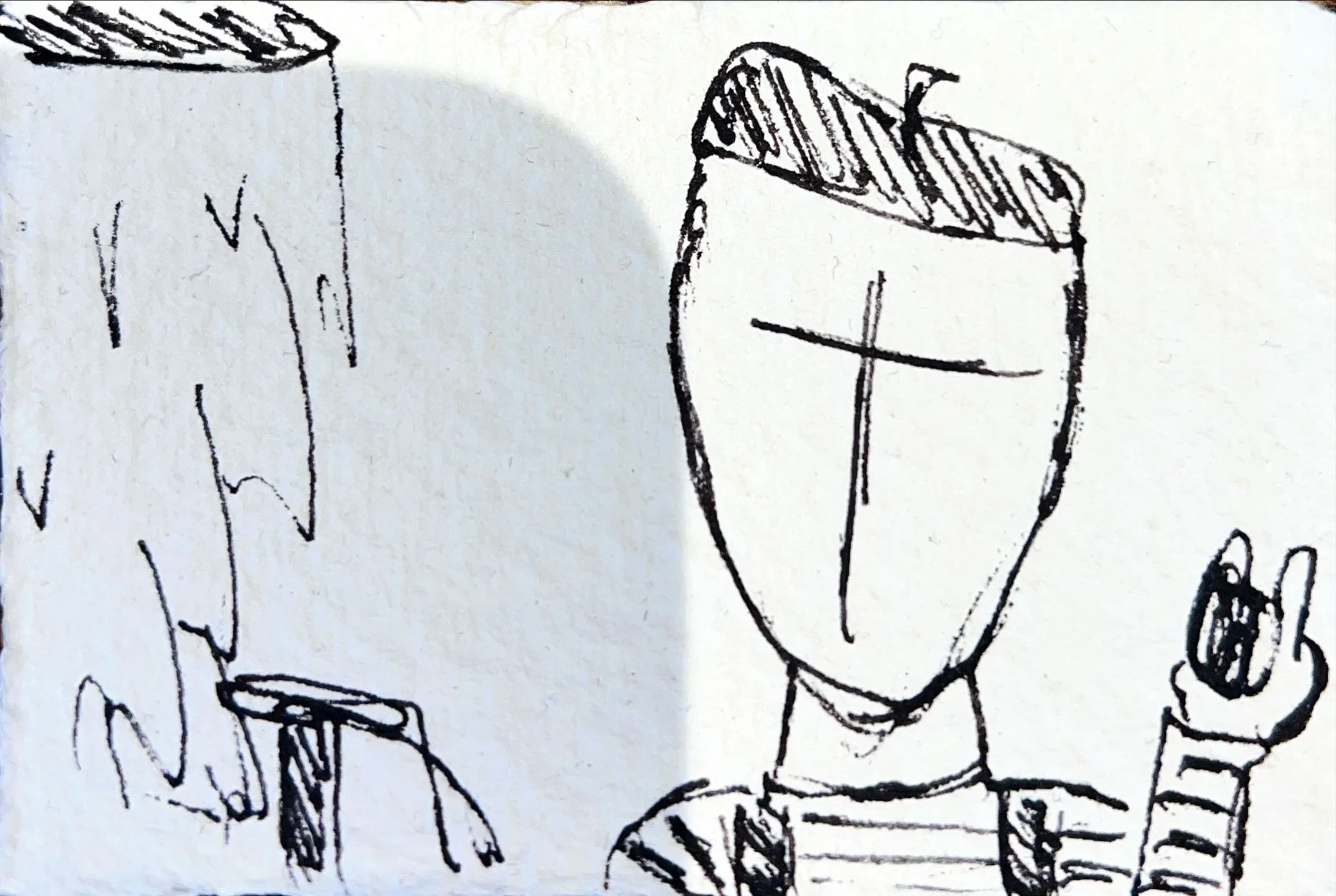 A black and white line drawing of a cartoon character with a rectangular face, a cross on the forehead, and short hair. The character is wearing a striped shirt and holding an object in the right hand.