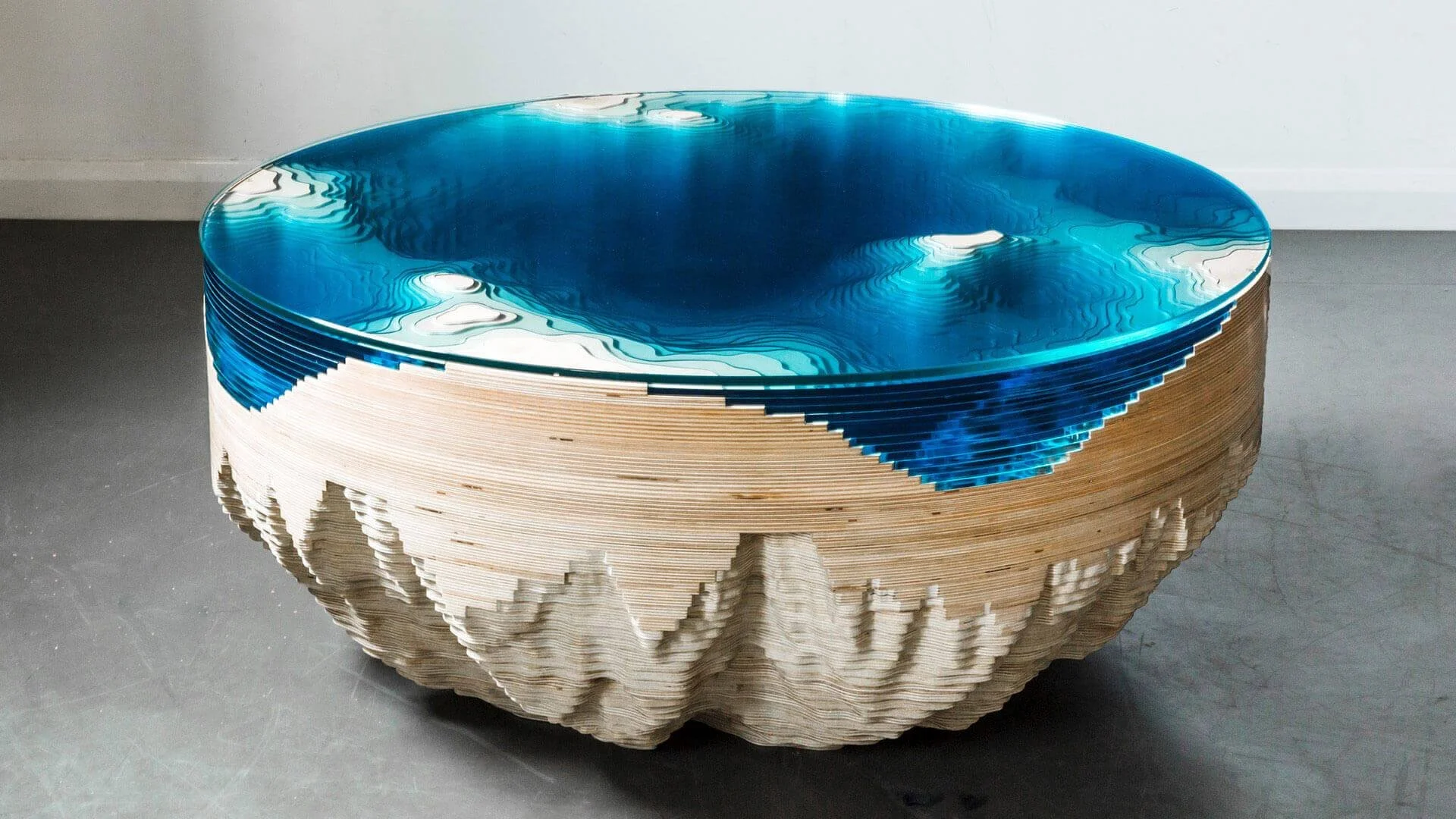 Detail of the Abyss Table showing hand-finished glass and birchwood craftsmanship, Duffy London