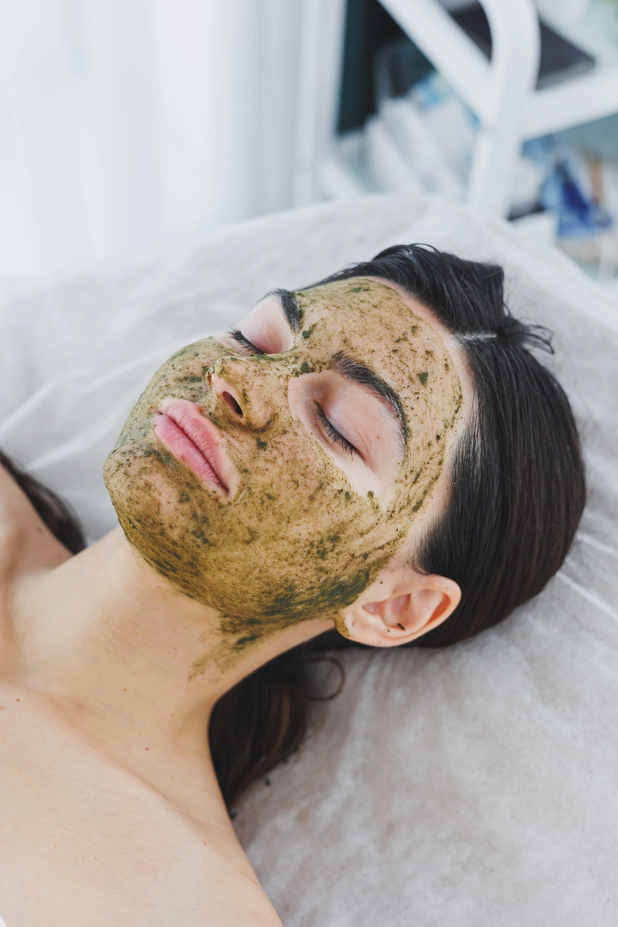 beautician-makes-mask-womans-face-maskpeeling-face-spa-procedures-skin-care-woman-receives-facial-care-from-beautician.jpg