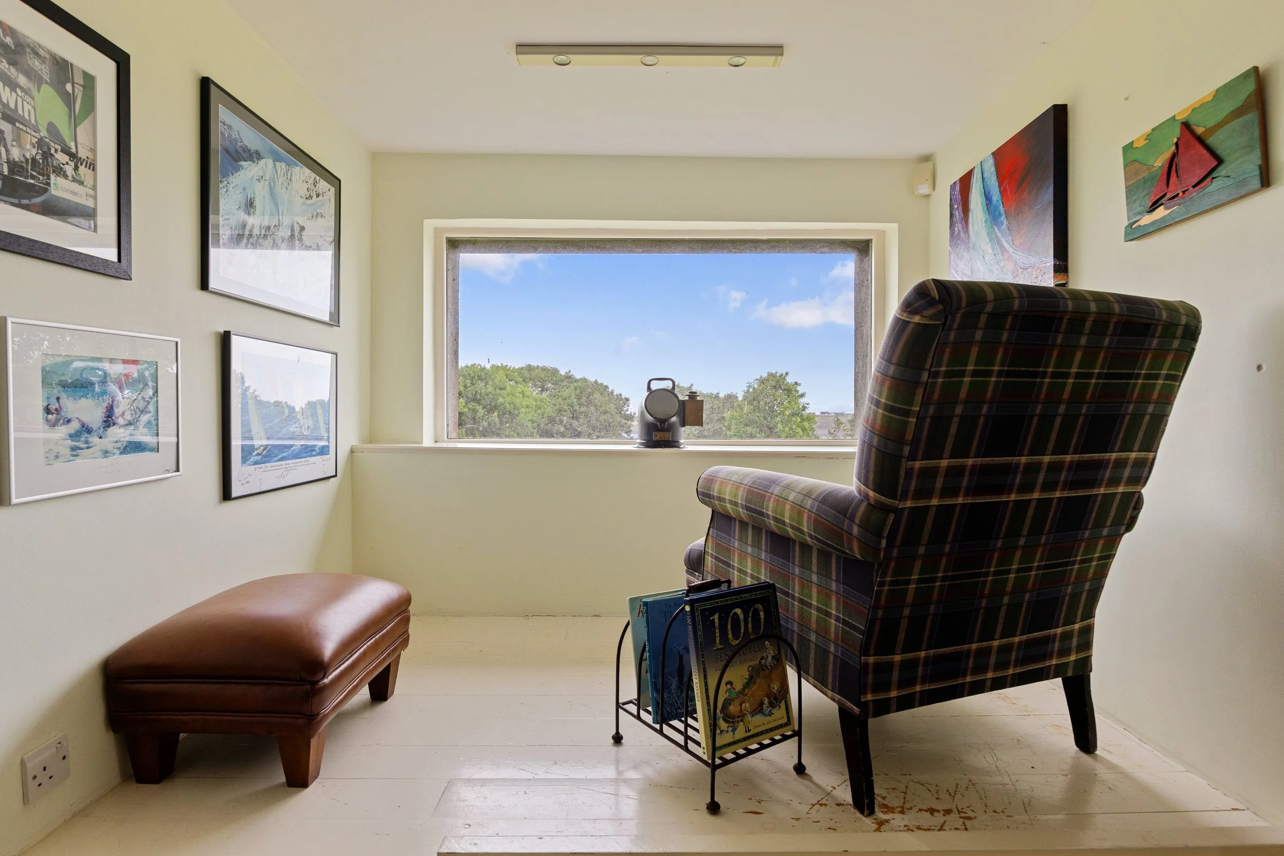 THE READING CORNER 

A quiet little retreat with a view — perfect for disappearing with a book for a while.