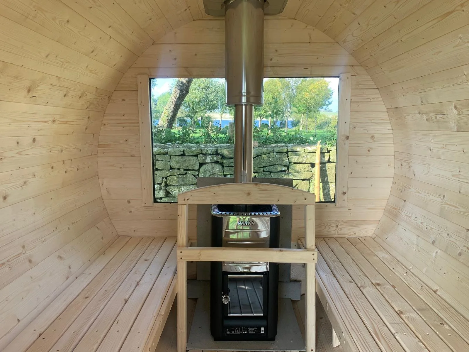 SOAK IT ALL IN
Fire up the hot tub and settle in, with the fields and Galway Bay beyond.