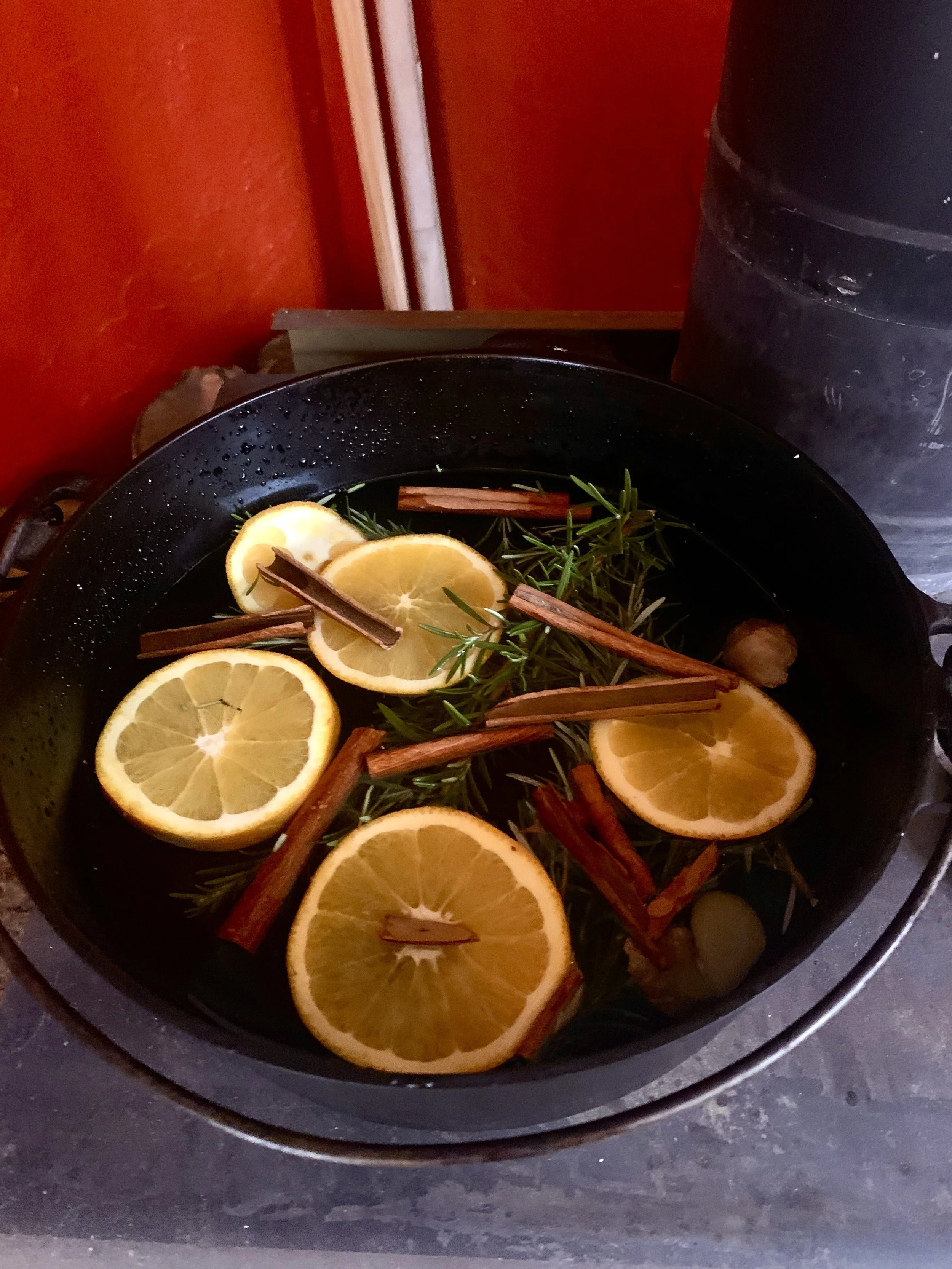 Warm potpourri simmering on the fireplace