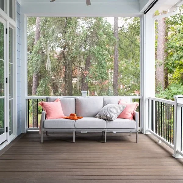 enh-hilton-head-002-cb-dream-home-trn-railing-wt-lighting-front-porch-sofa_Media-Carousel.jpg