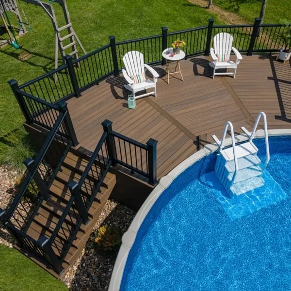 enh-wardensville-27-cb-enh-railing-bk-pool-adirondacks-swing-set-drone-closer_Media-Carousel.jpg