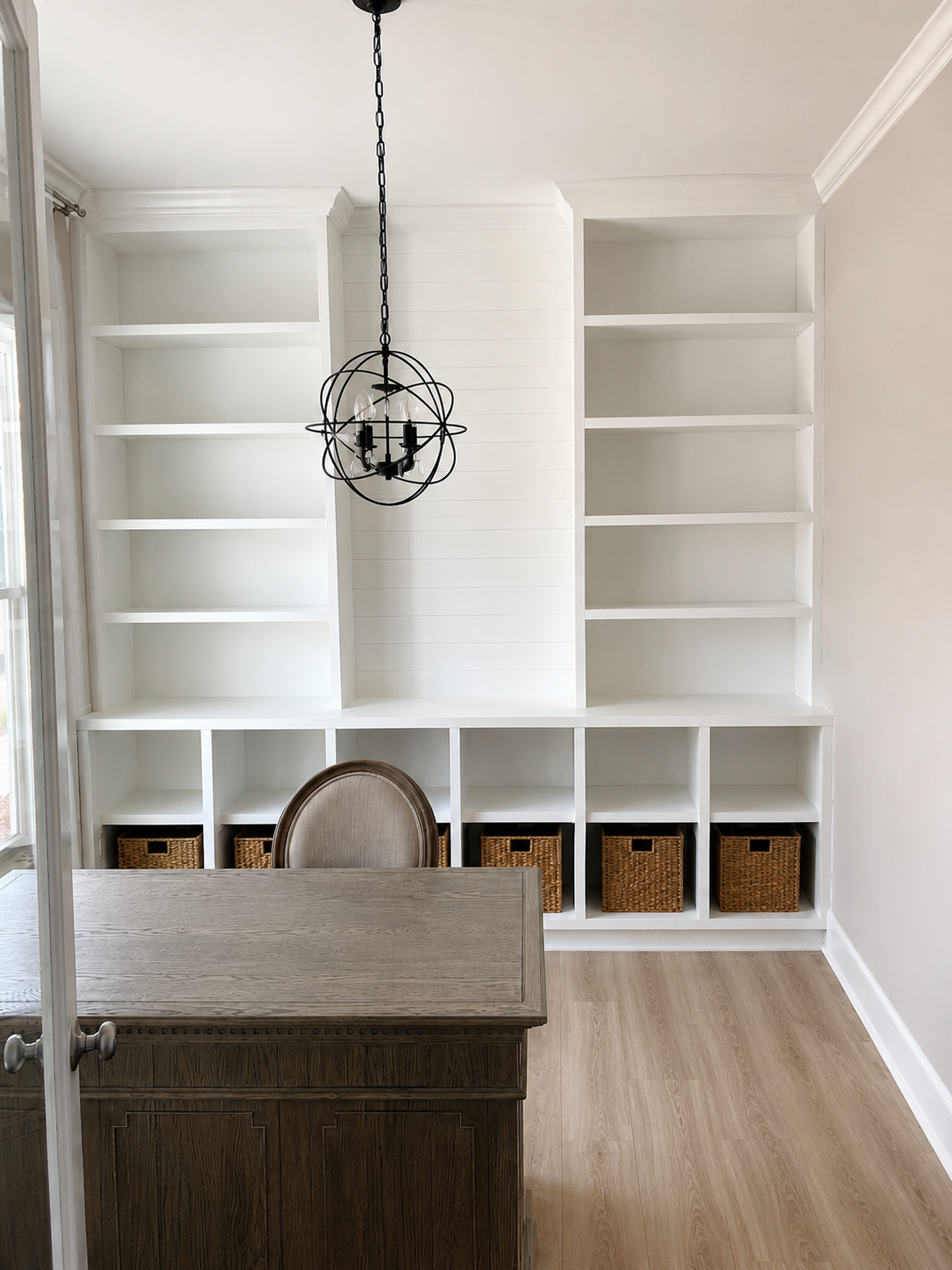 Custom office built-in featuring multiple shelves and cubbies for sufficient storage. 
Project Location: Wake Forest, NC