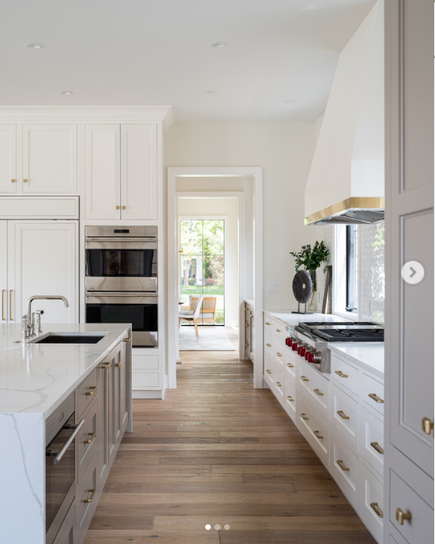 how to layer warm tones in  your kitchen picture shoes white kithen with wood and gold accents